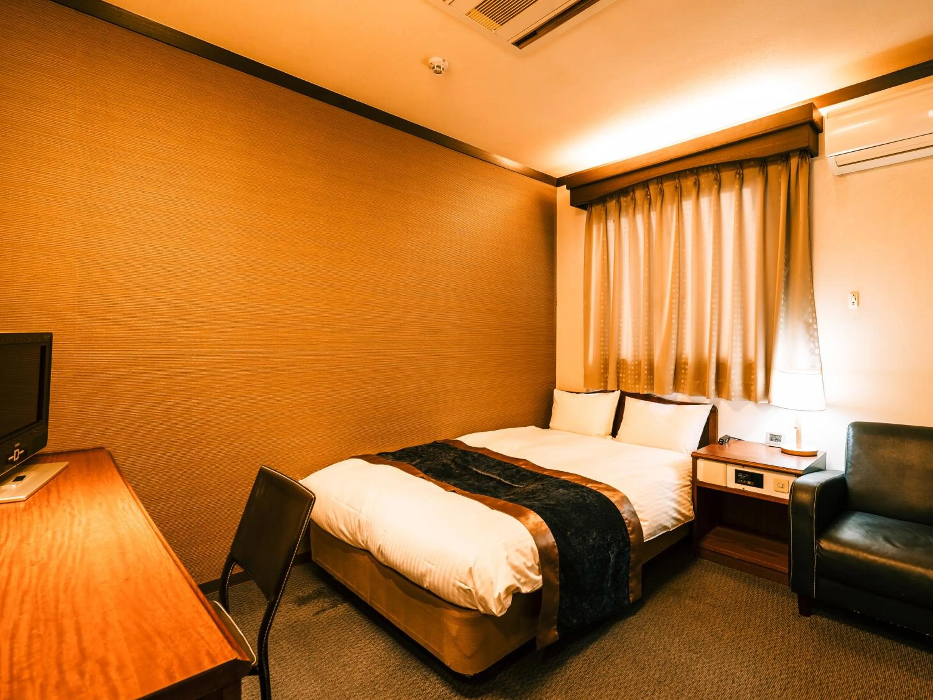 Photo of the whole room, Bed in Hotel AreaOne Takamatsu