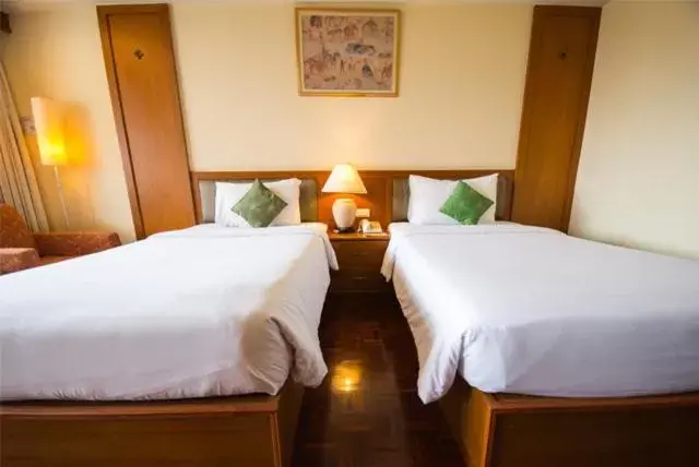 Bed in Chakungrao Riverview Hotel