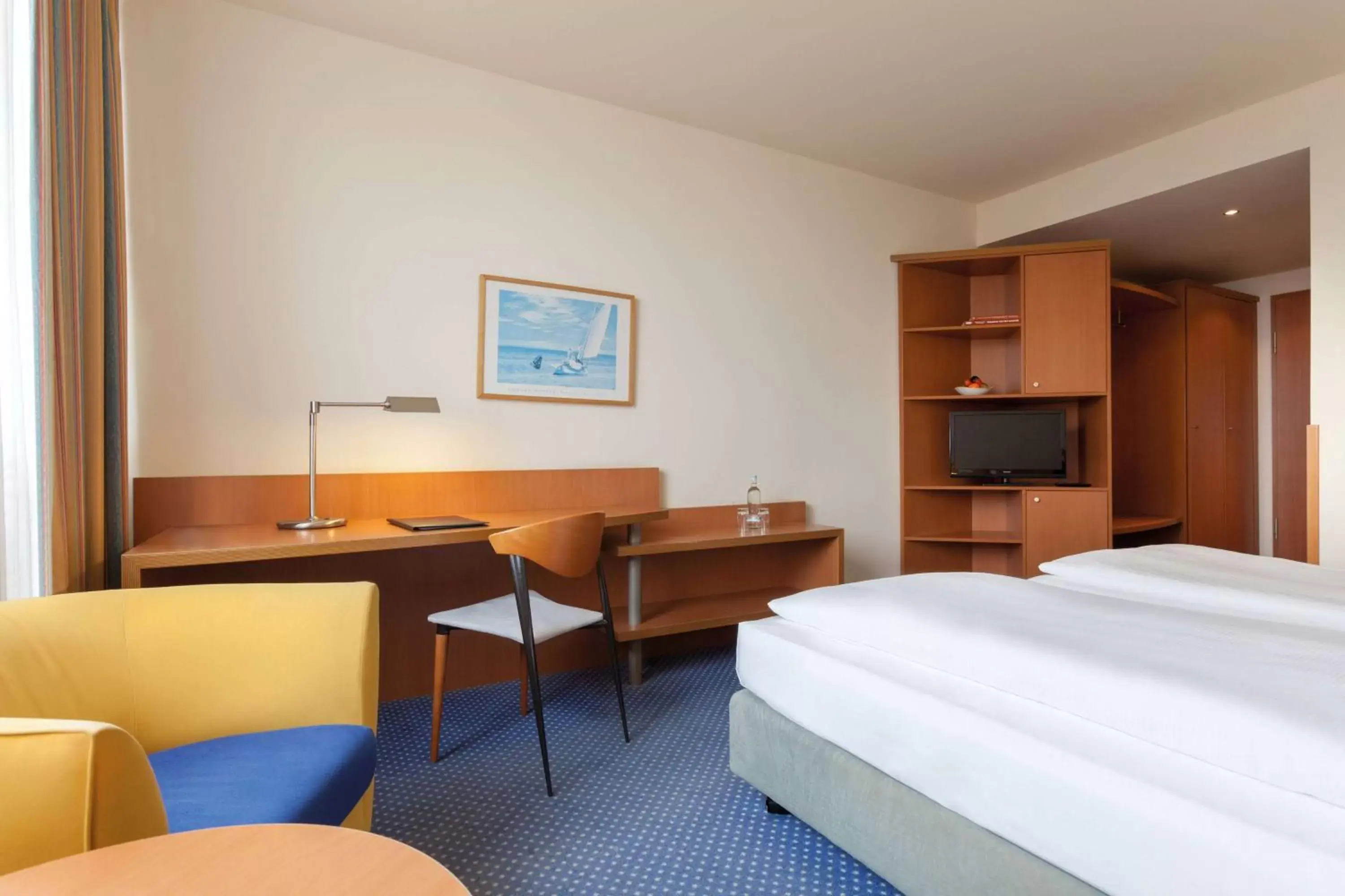 Photo of the whole room, Bed in Vienna House by Wyndham Baltic Stralsund Photo of the whole room, Bed in Vienna House by Wyndham Baltic Stralsund