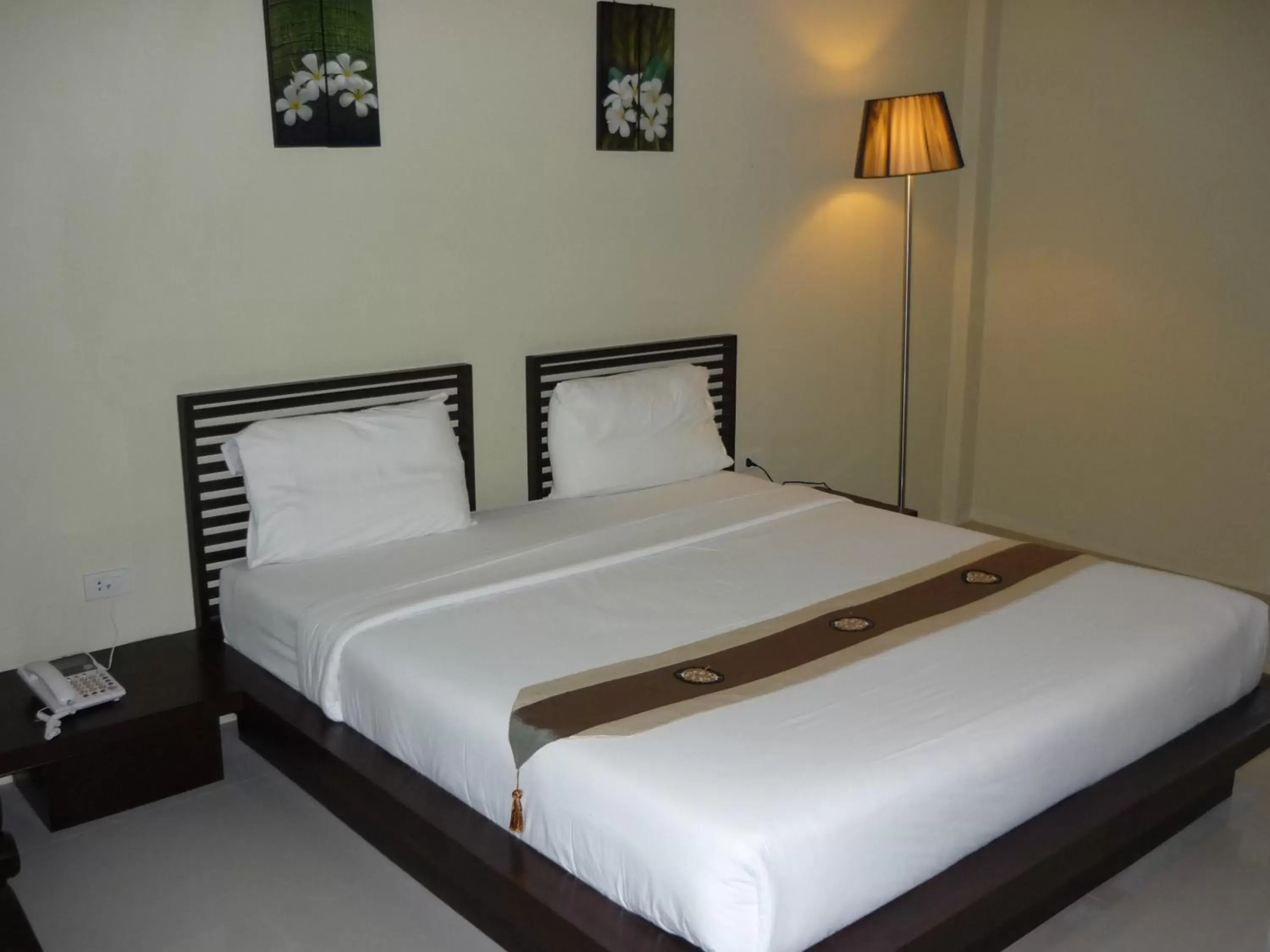 Bed in The RiverKwai Bridge Resort