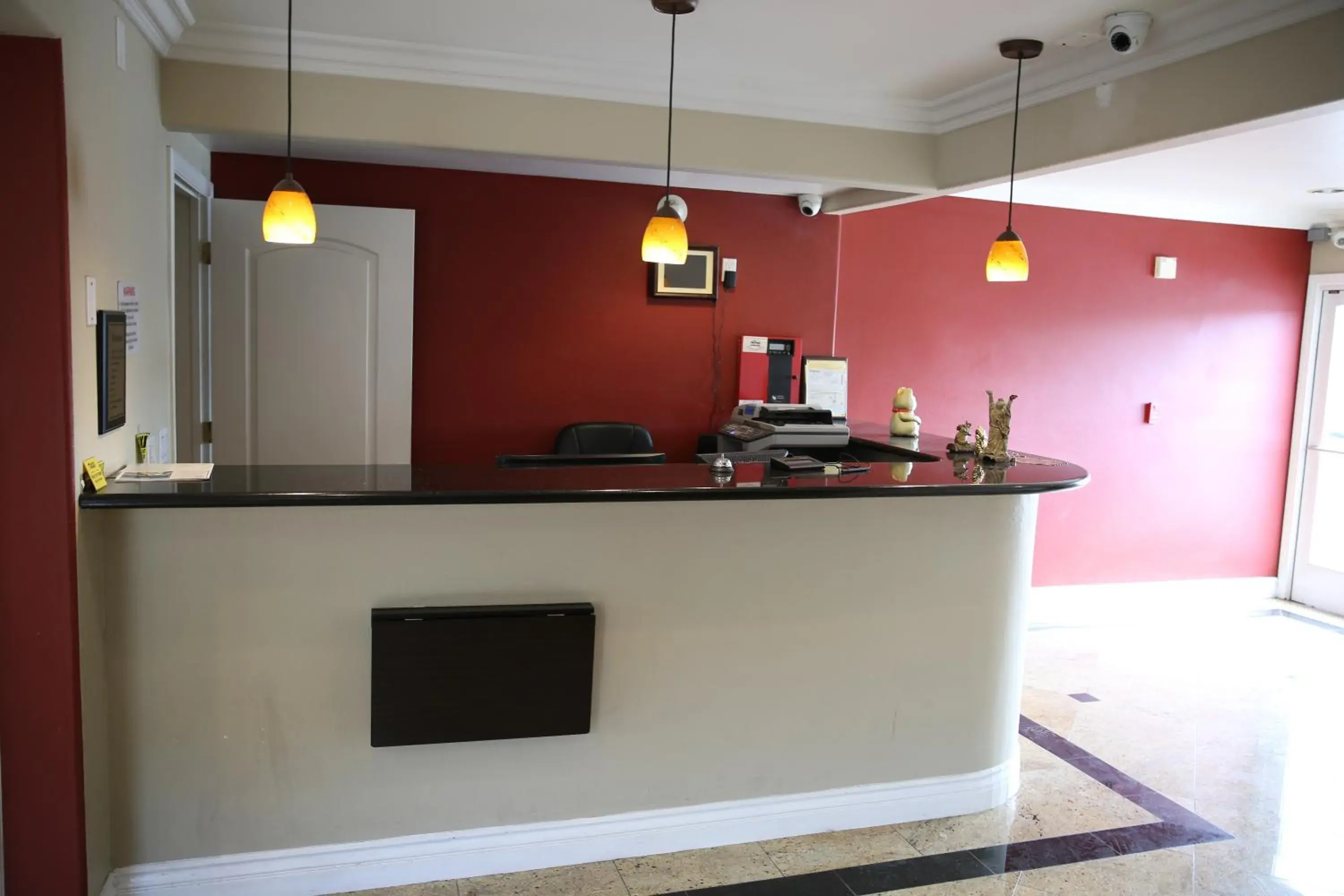 Lobby or reception in Chateau Inn & Suites Lobby or reception in Chateau Inn & Suites