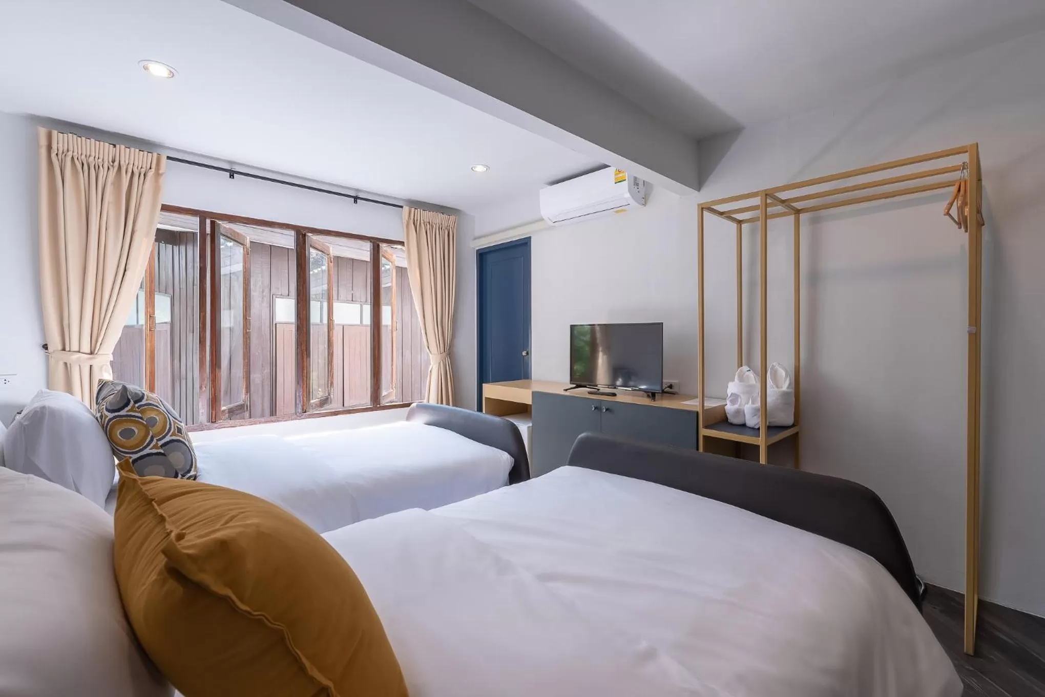 Photo of the whole room, Bed in The Mellow Pillow Hotel @ Chiang Mai Gate