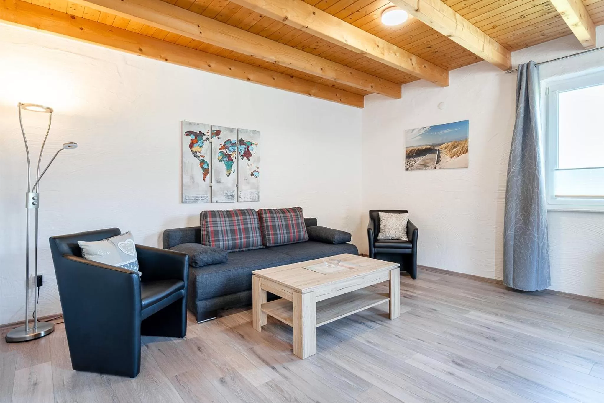 Living room in Villa Moorstern am Badesee Tannenhausen