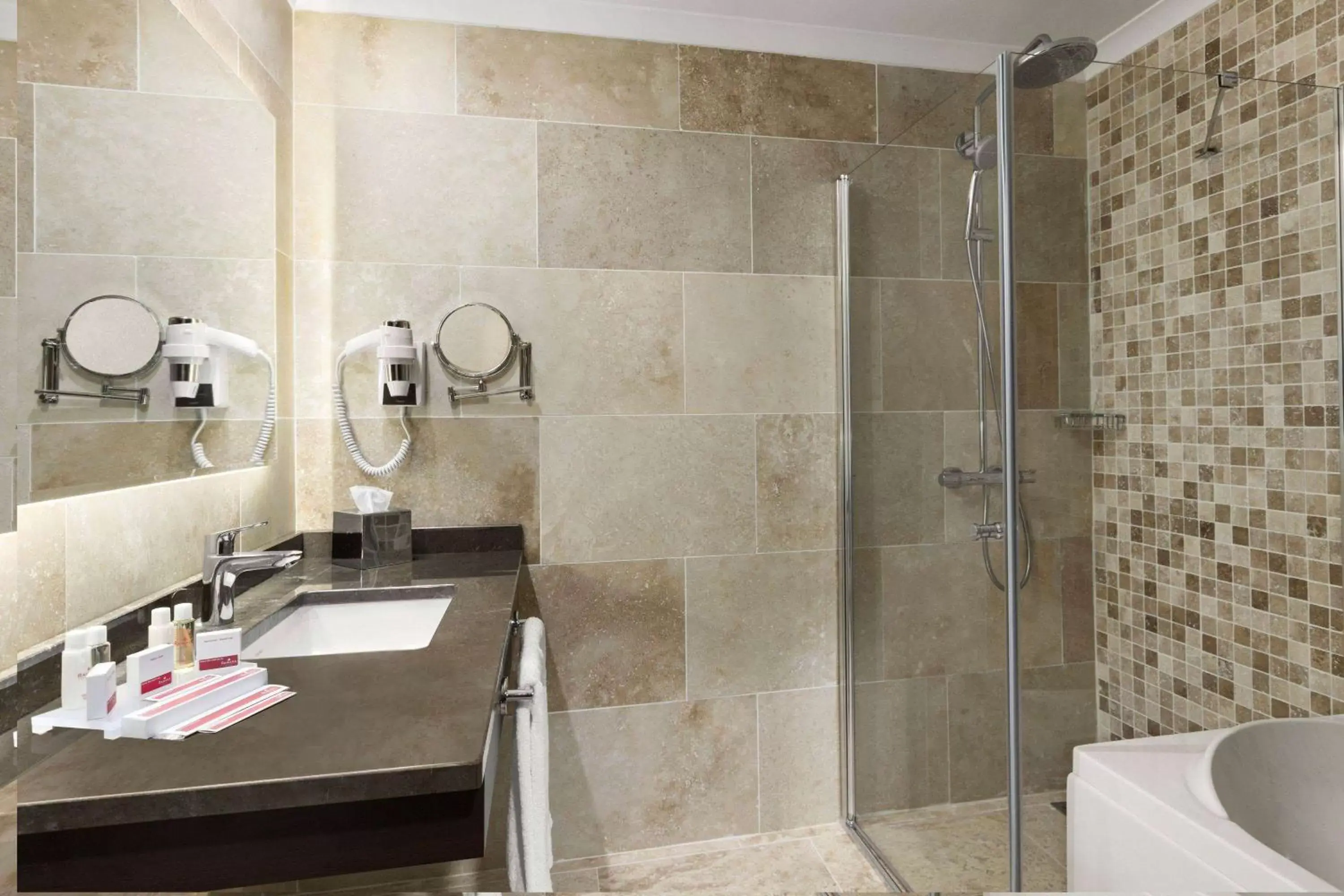 TV and multimedia, Bathroom in Ramada Hotel & Suites by Wyndham Istanbul Merter