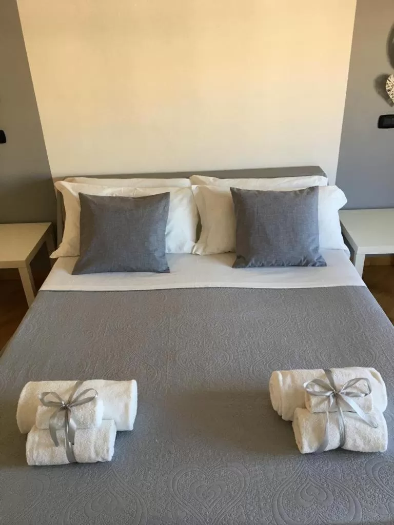 Bed in Maison Arena Bovio