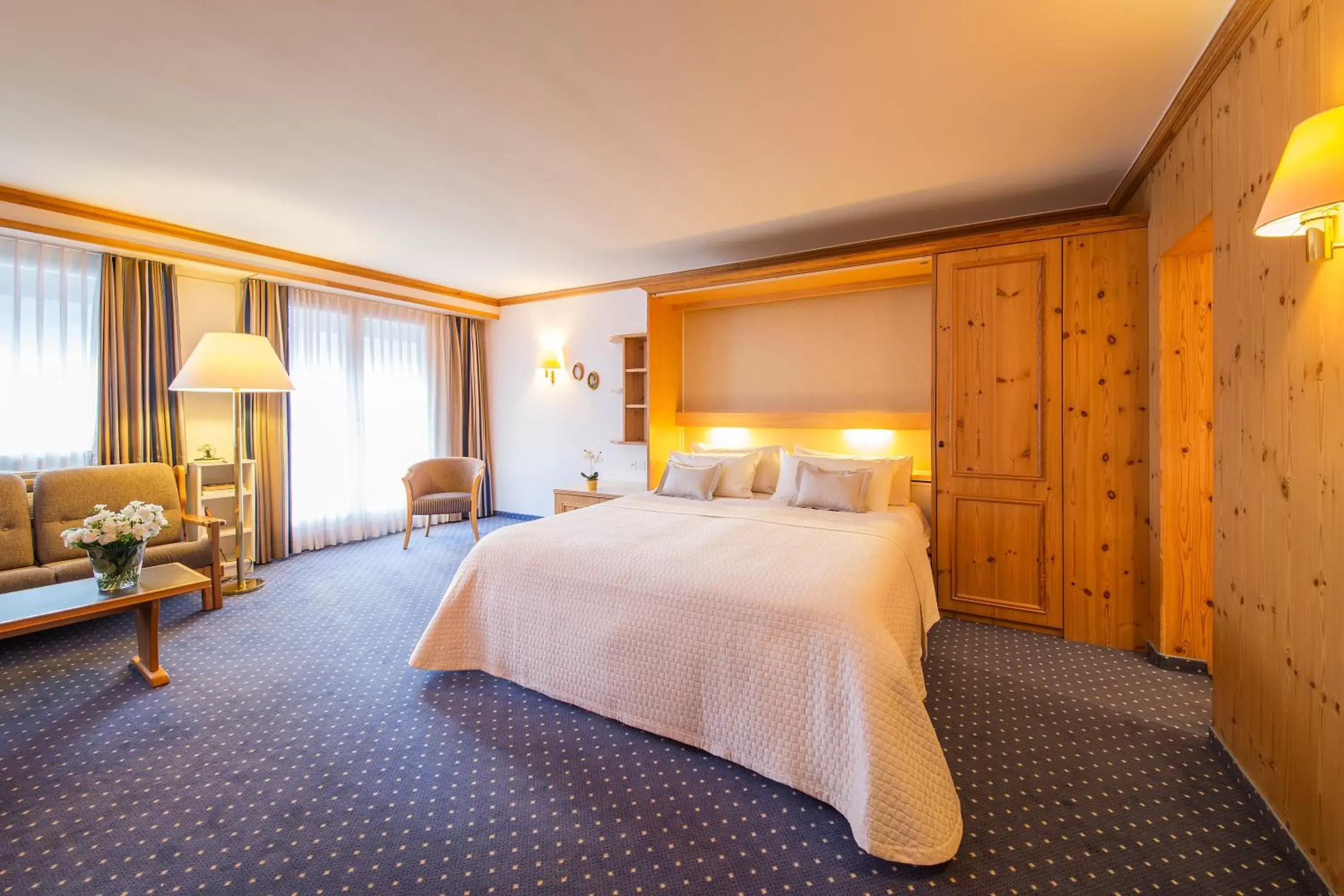 Bedroom, Bed in Hotel Europa St. Moritz
