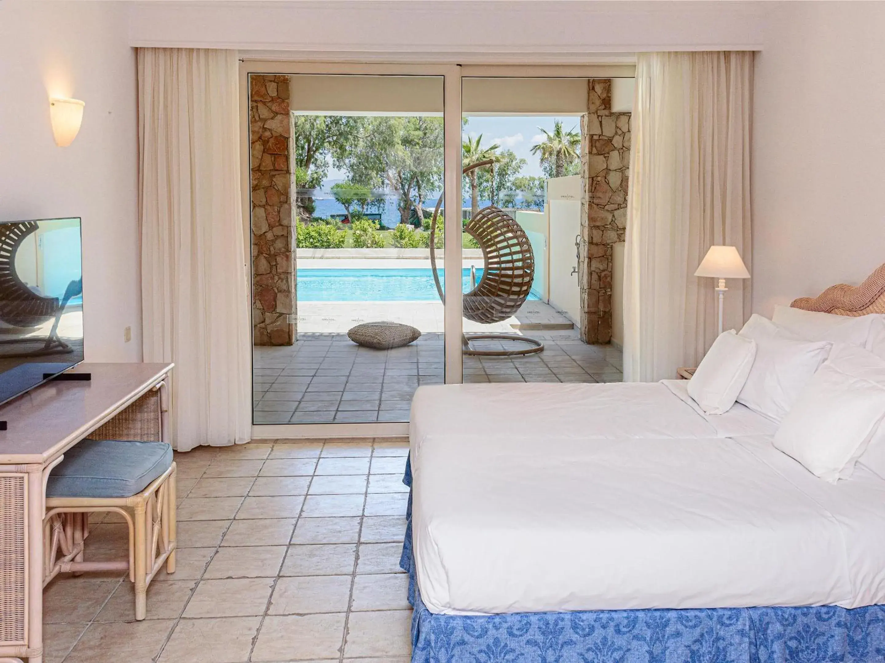 Photo of the whole room, Pool View in Grecotel Kos Imperial