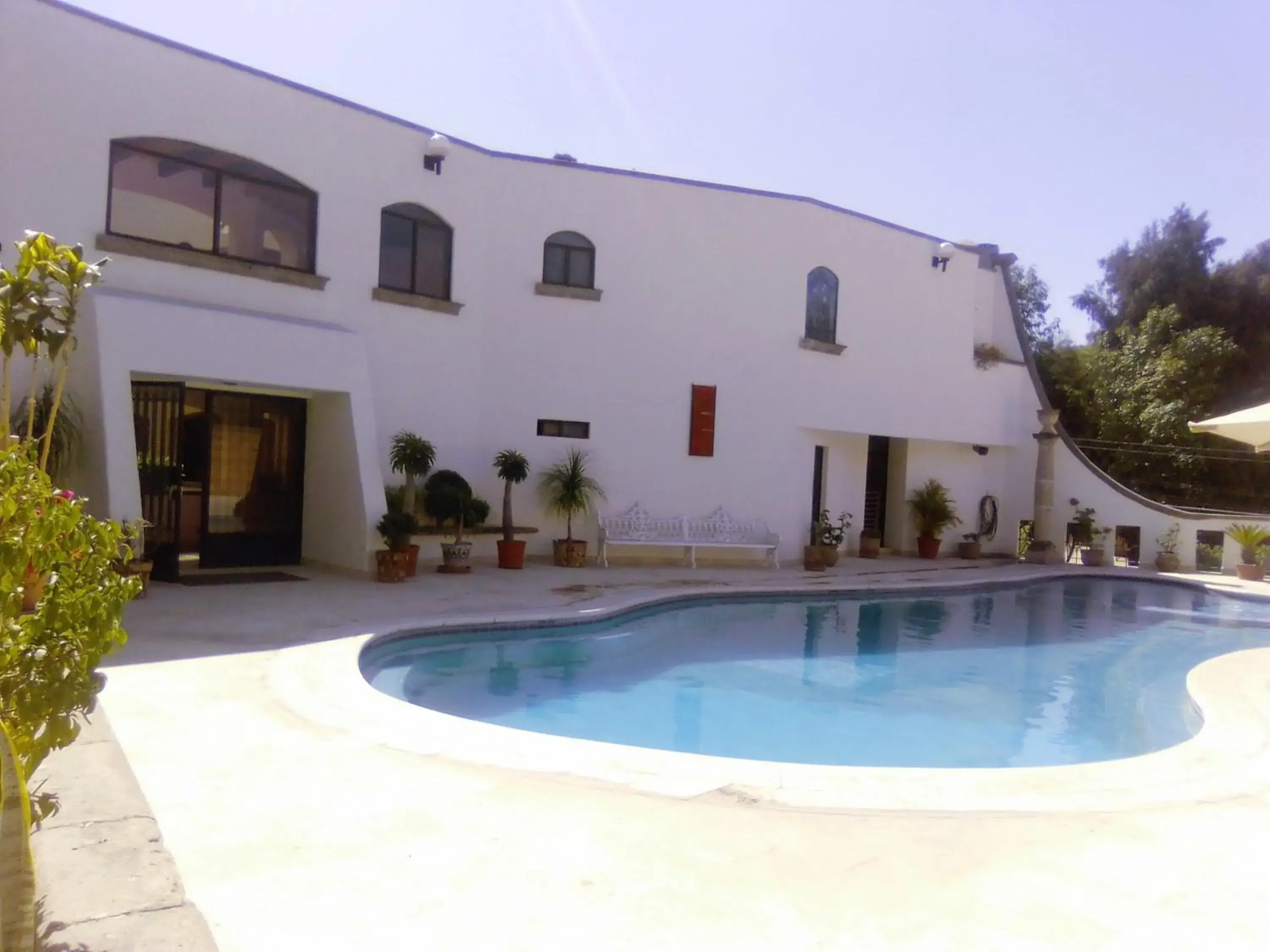 Swimming pool, Property Building in Hotel Del Parque