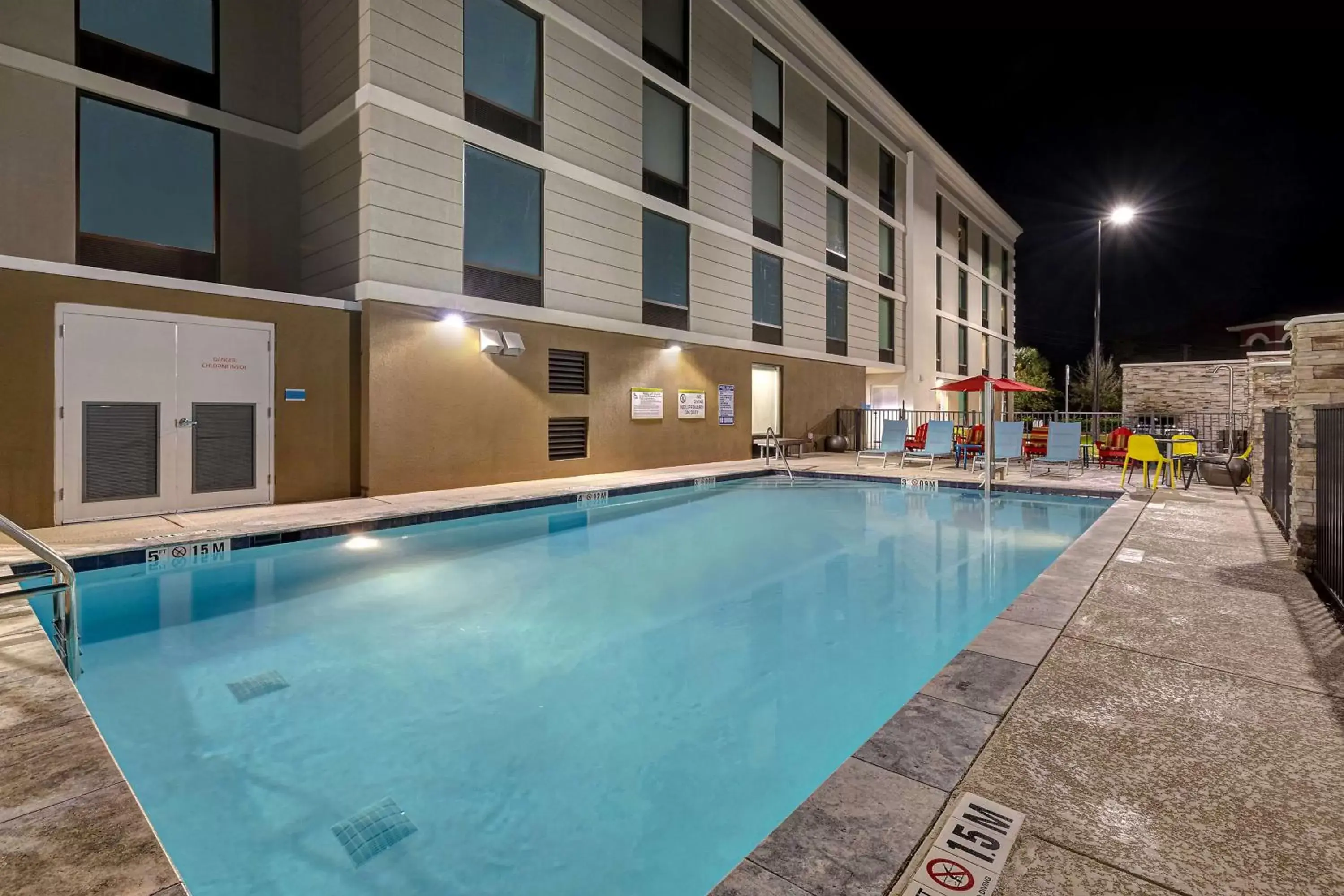 Property building, Swimming Pool in Home2 Suites by Hilton Gulf Breeze Pensacola Area, FL