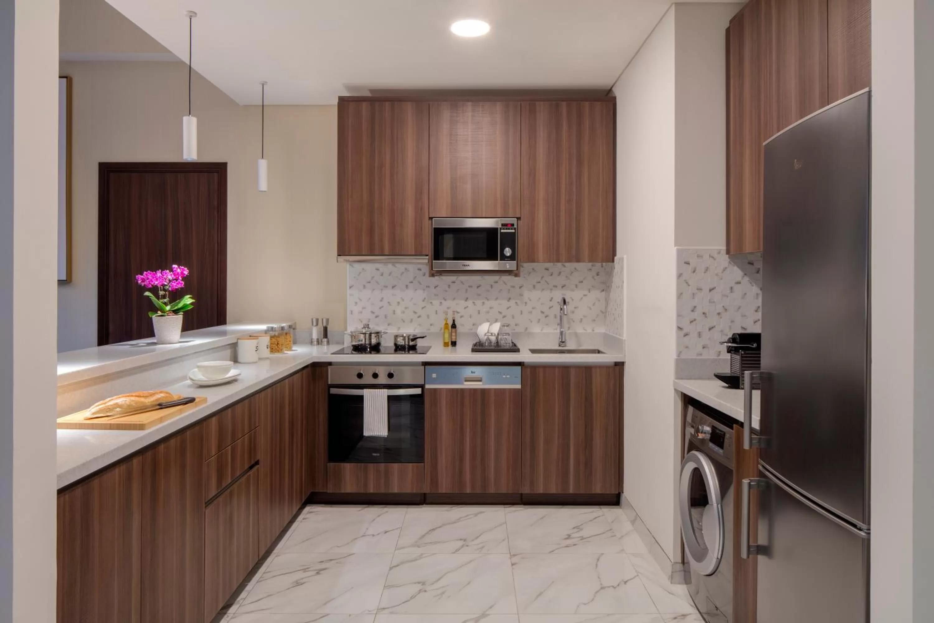 Kitchen or kitchenette in Avani Plus Palm View Dubai Hotel & Suites