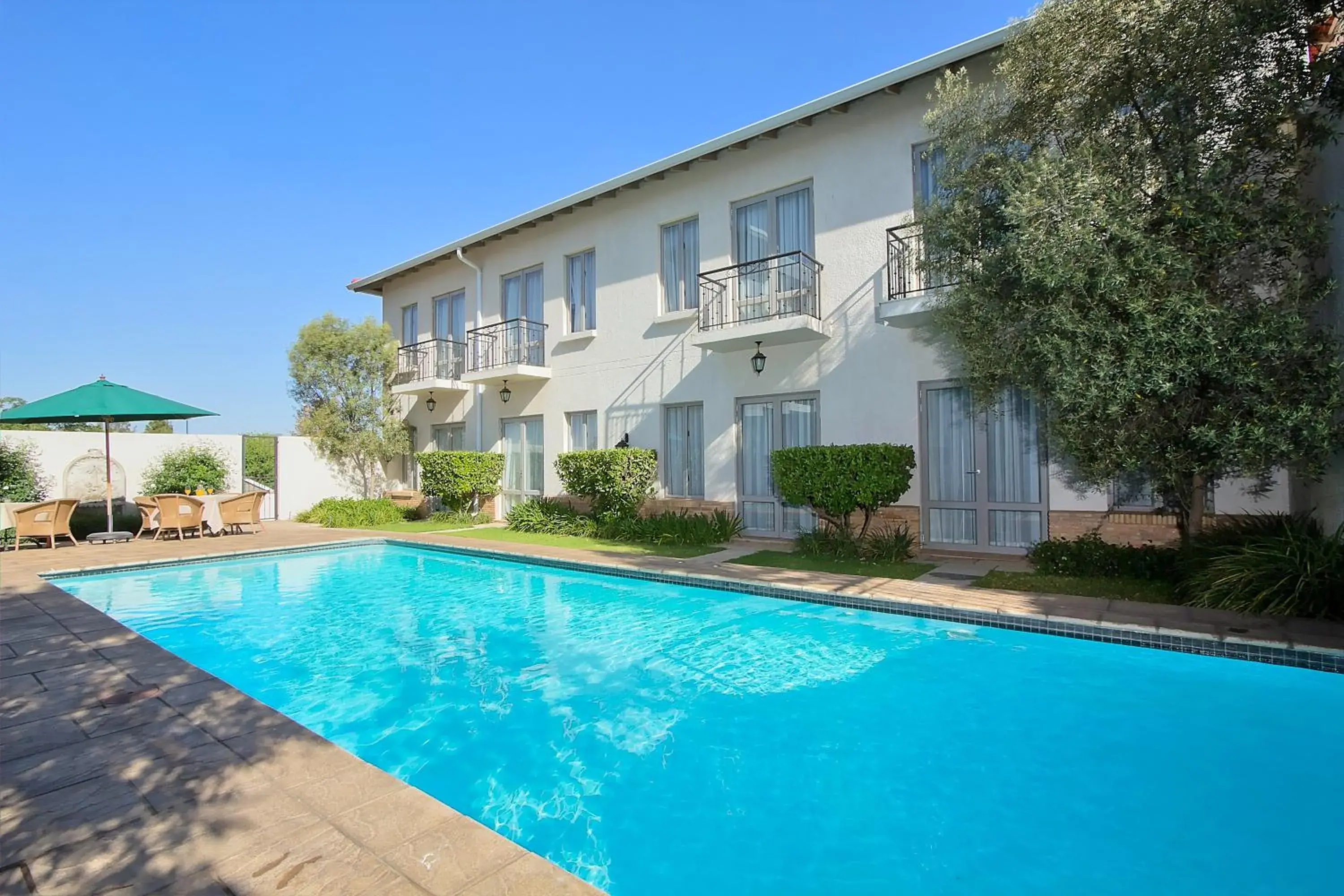 Pool view, Property Building in The Syrene Boutique Hotel