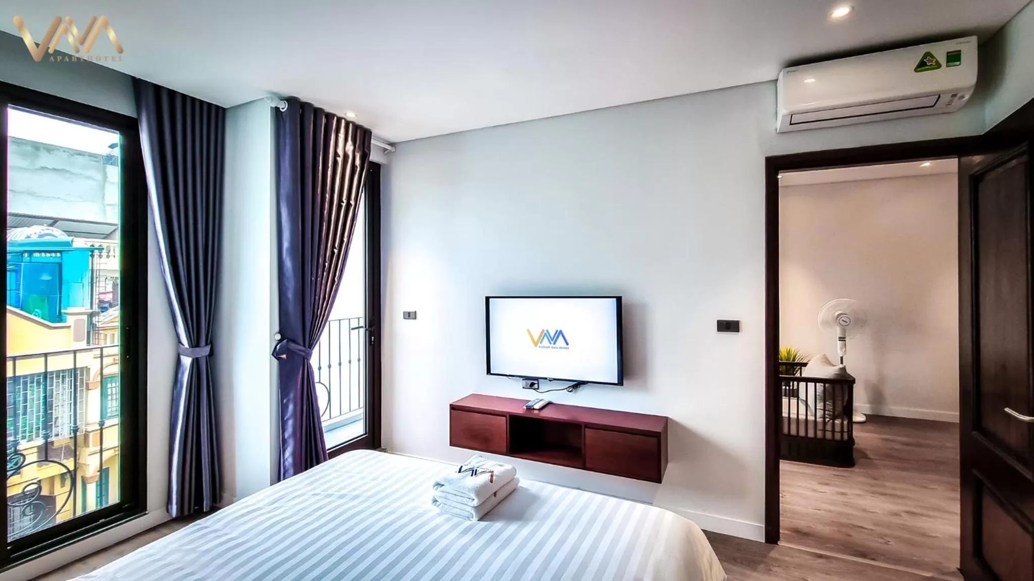 Bed in VNAHOMES APARTHOTEL