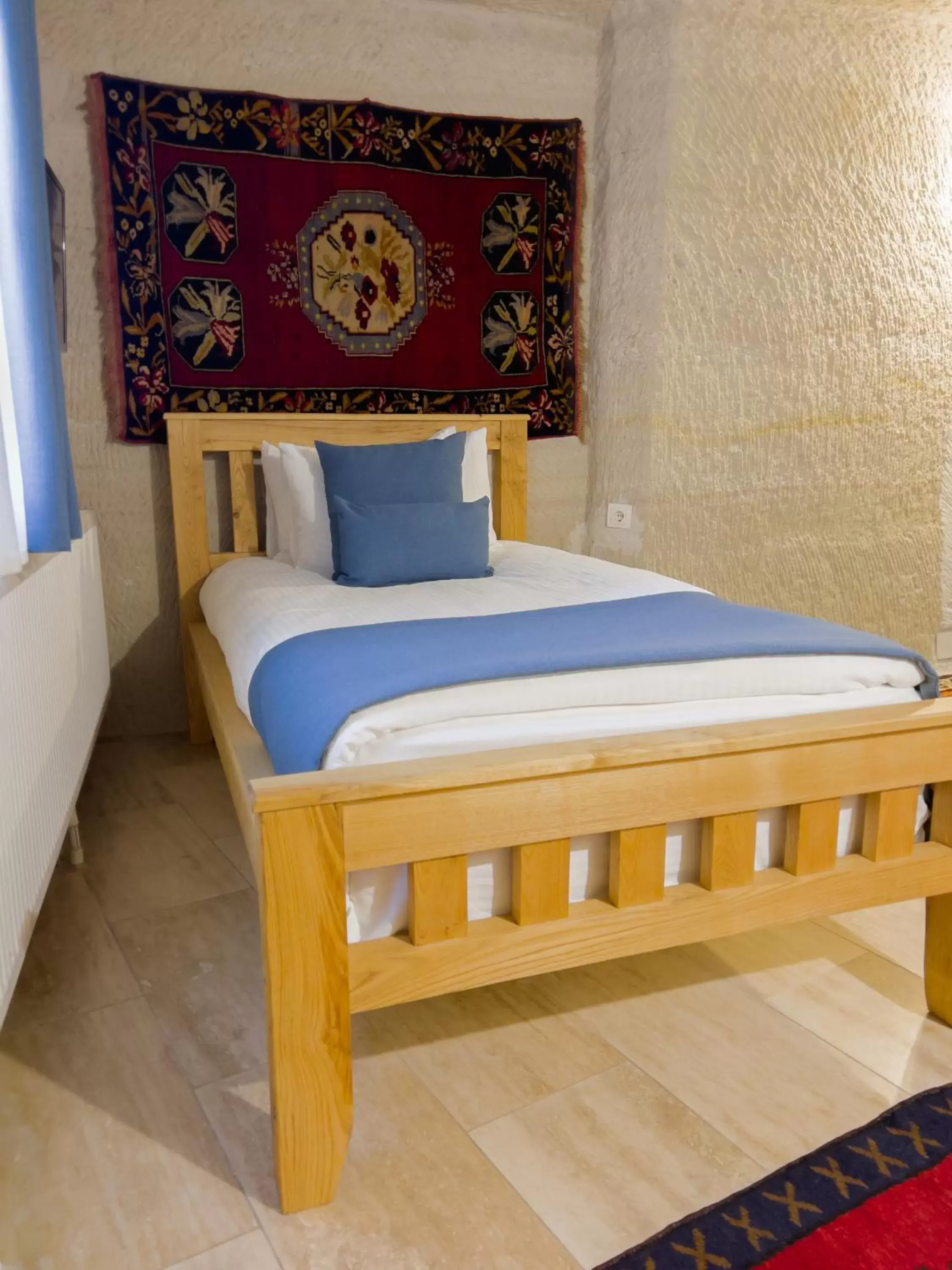 Bed in Local Cave House Hotel