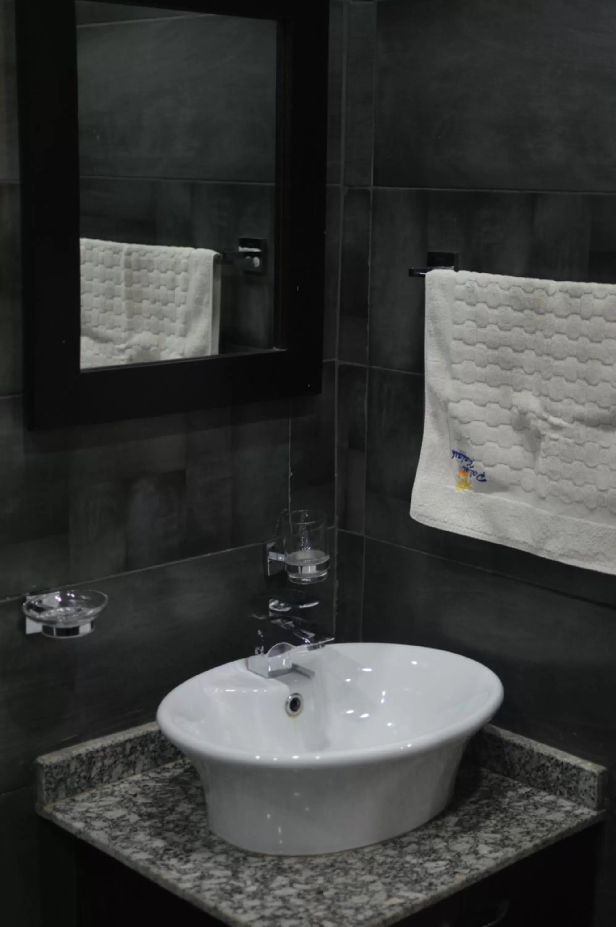 Bathroom in Palm Kalash Hotel