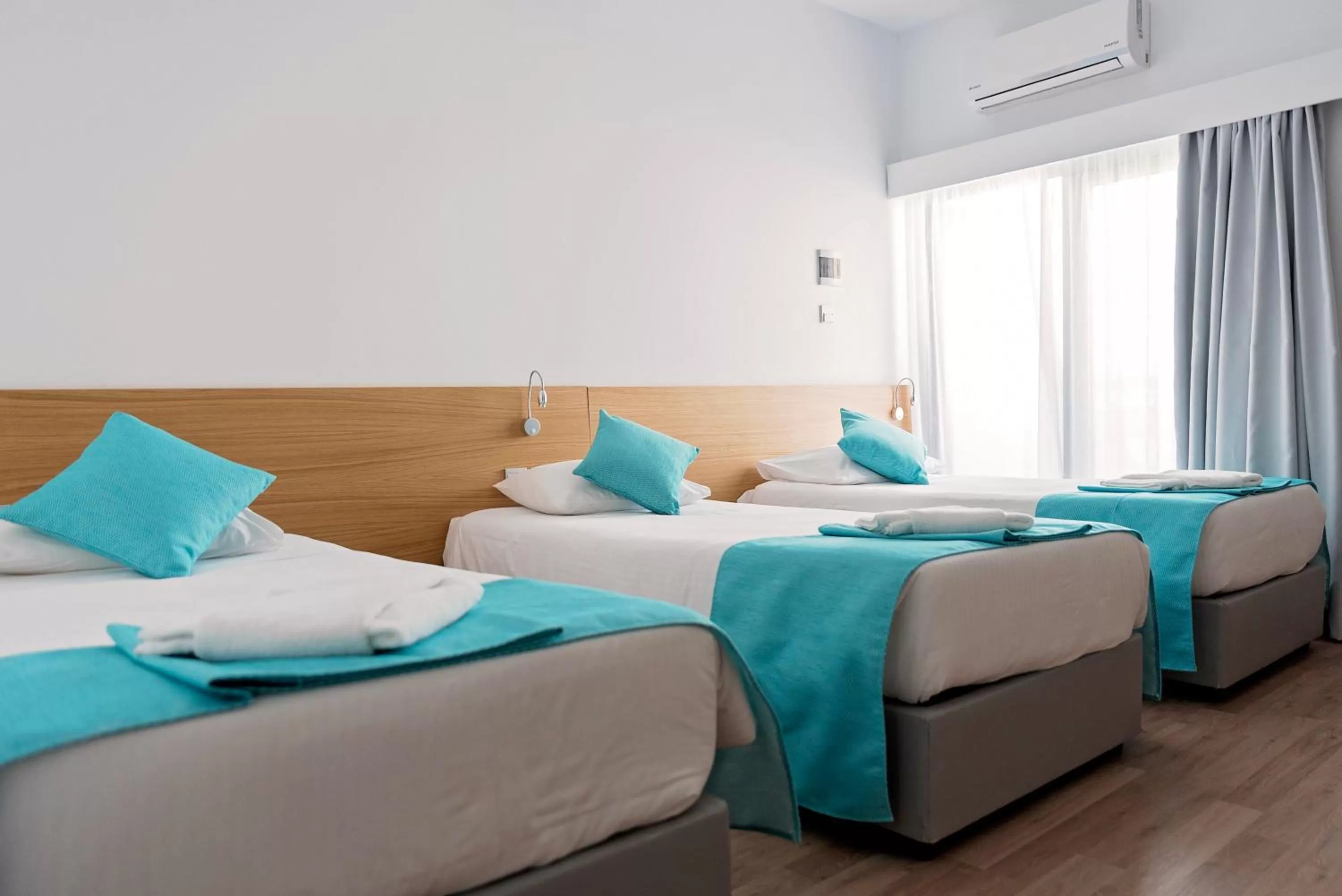 Bed in Pyramos Hotel