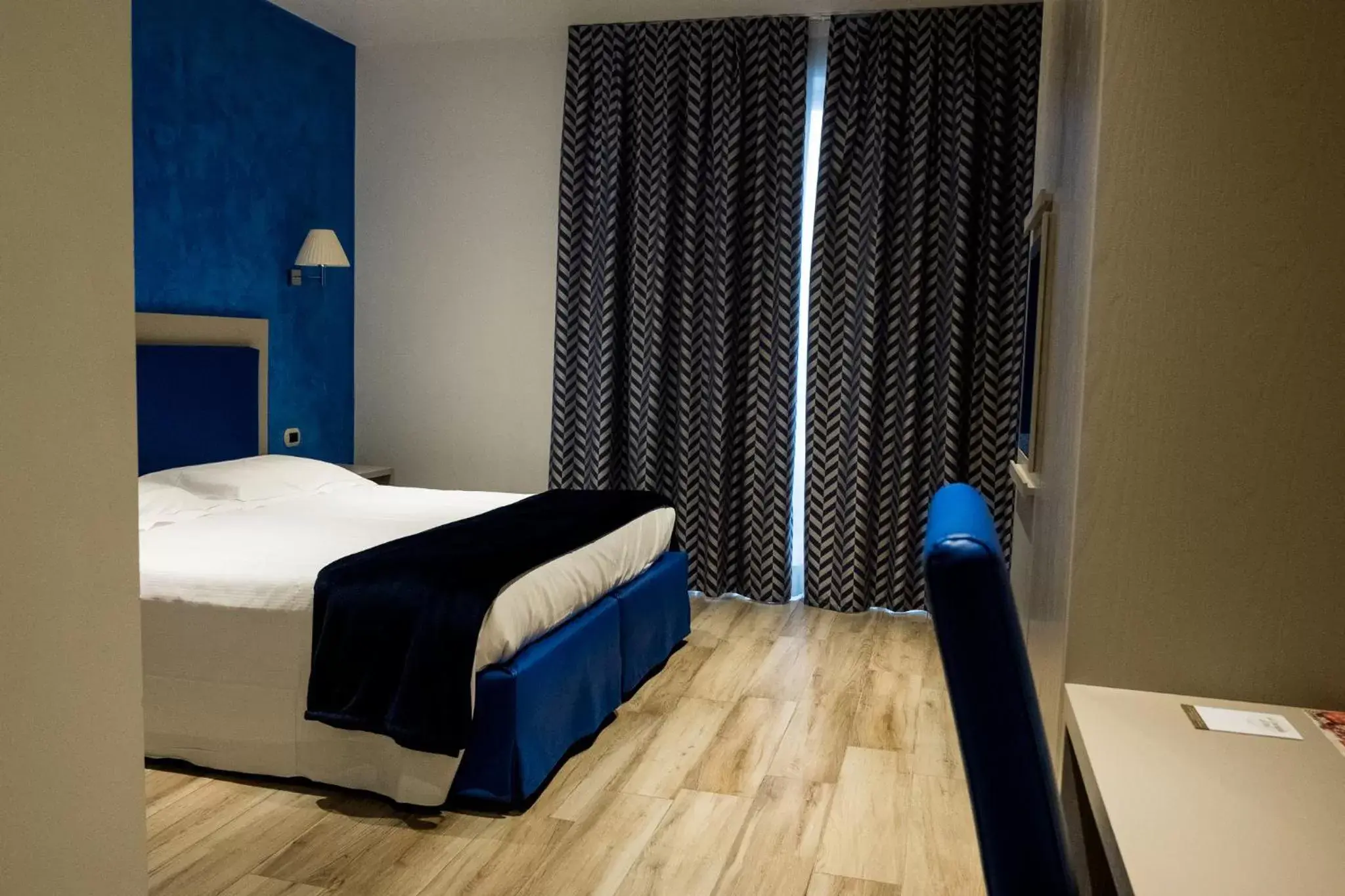 Bed in Palace Hotel "La CONCHIGLIA D' ORO"
