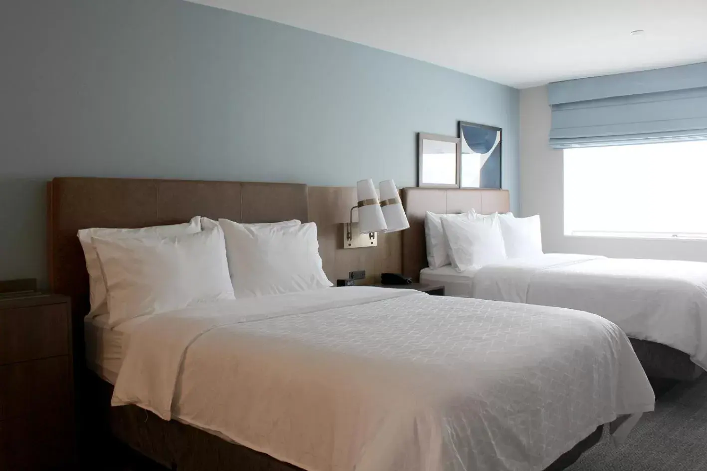 Bed in Staybridge Suites - Iowa City - Coralville, an IHG Hotel