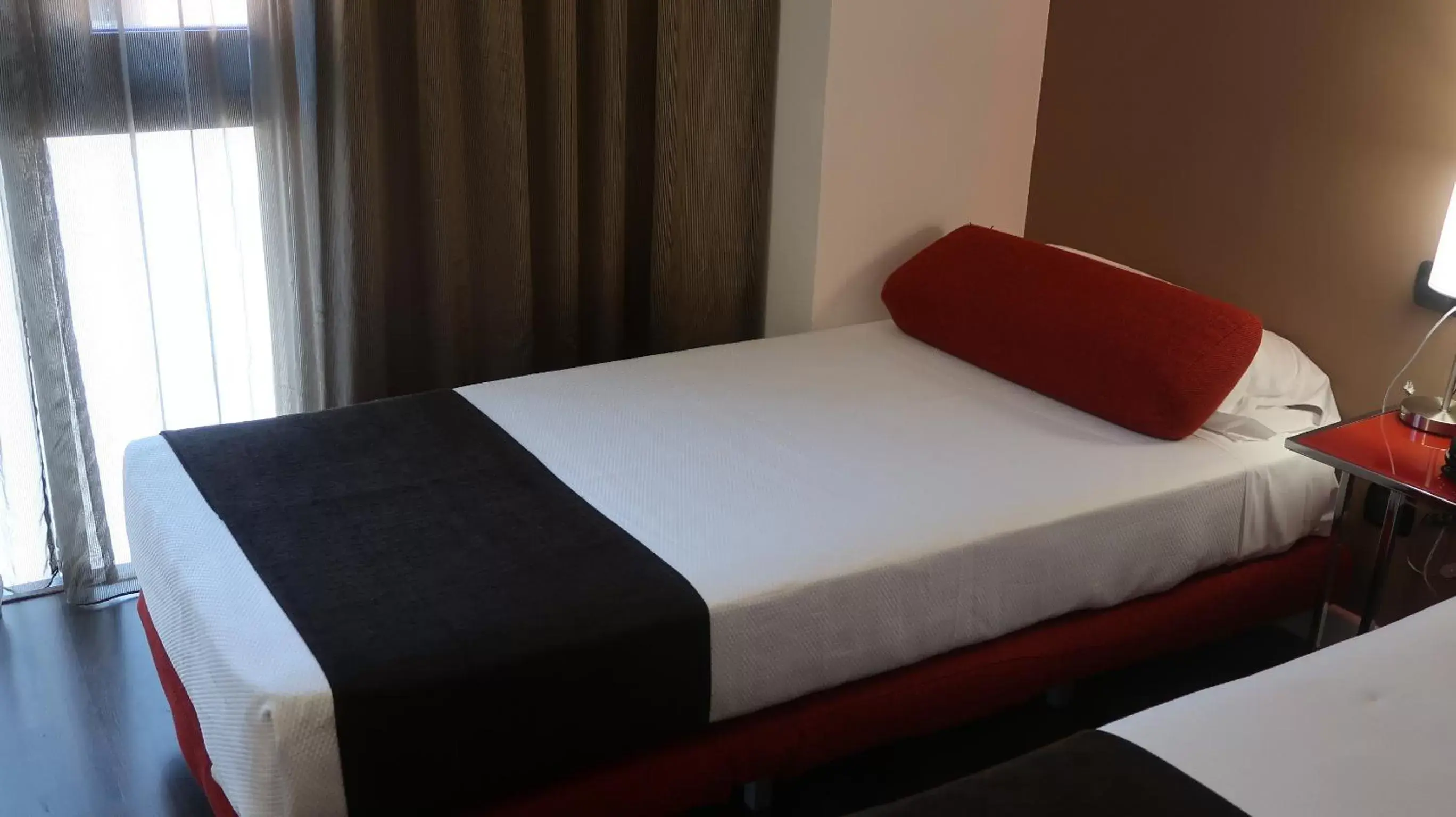 Bed in Hotel Teruel Plaza