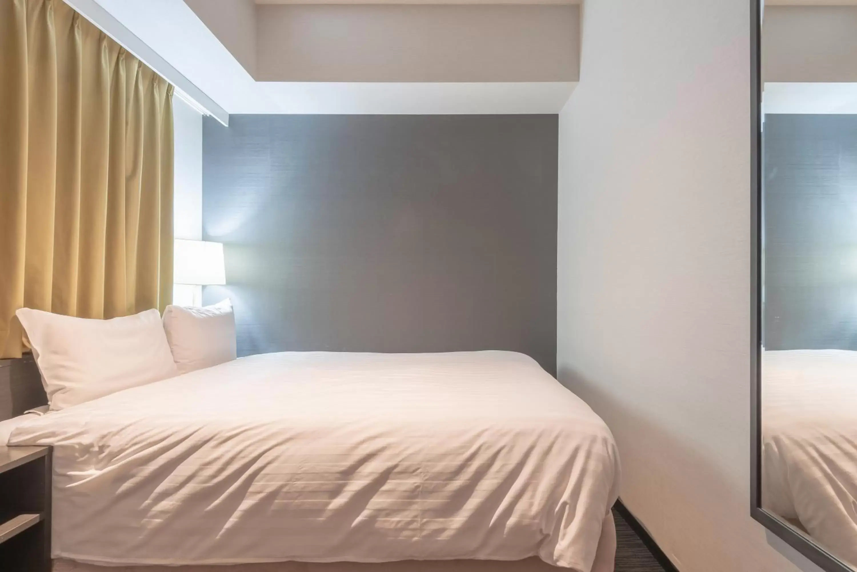 Bed in E Hotel Higashi Shinjuku Bed in E Hotel Higashi Shinjuku