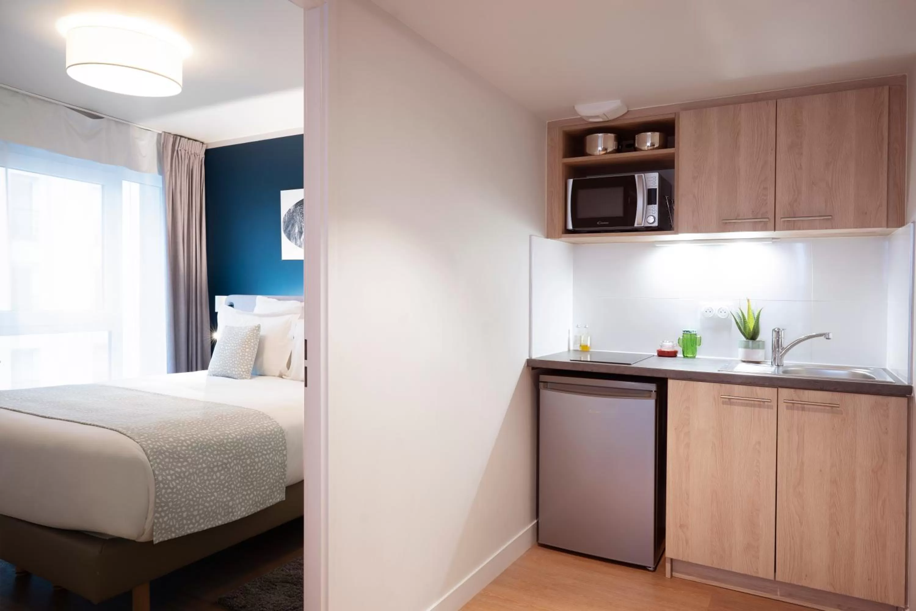 Kitchen or kitchenette, Bed in Residhome Saint Ouen