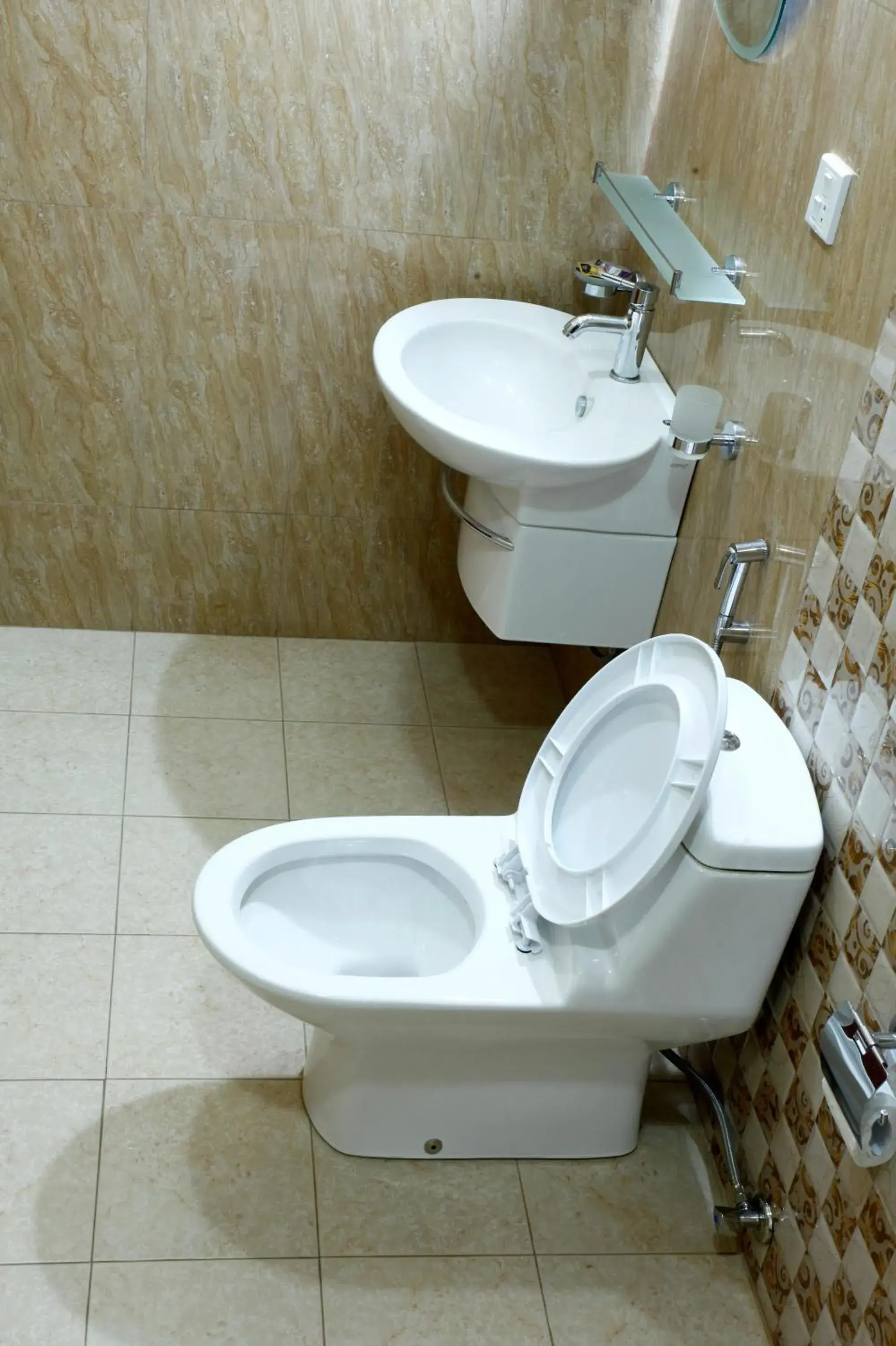 Bathroom in Alpine Hotel & Apartment