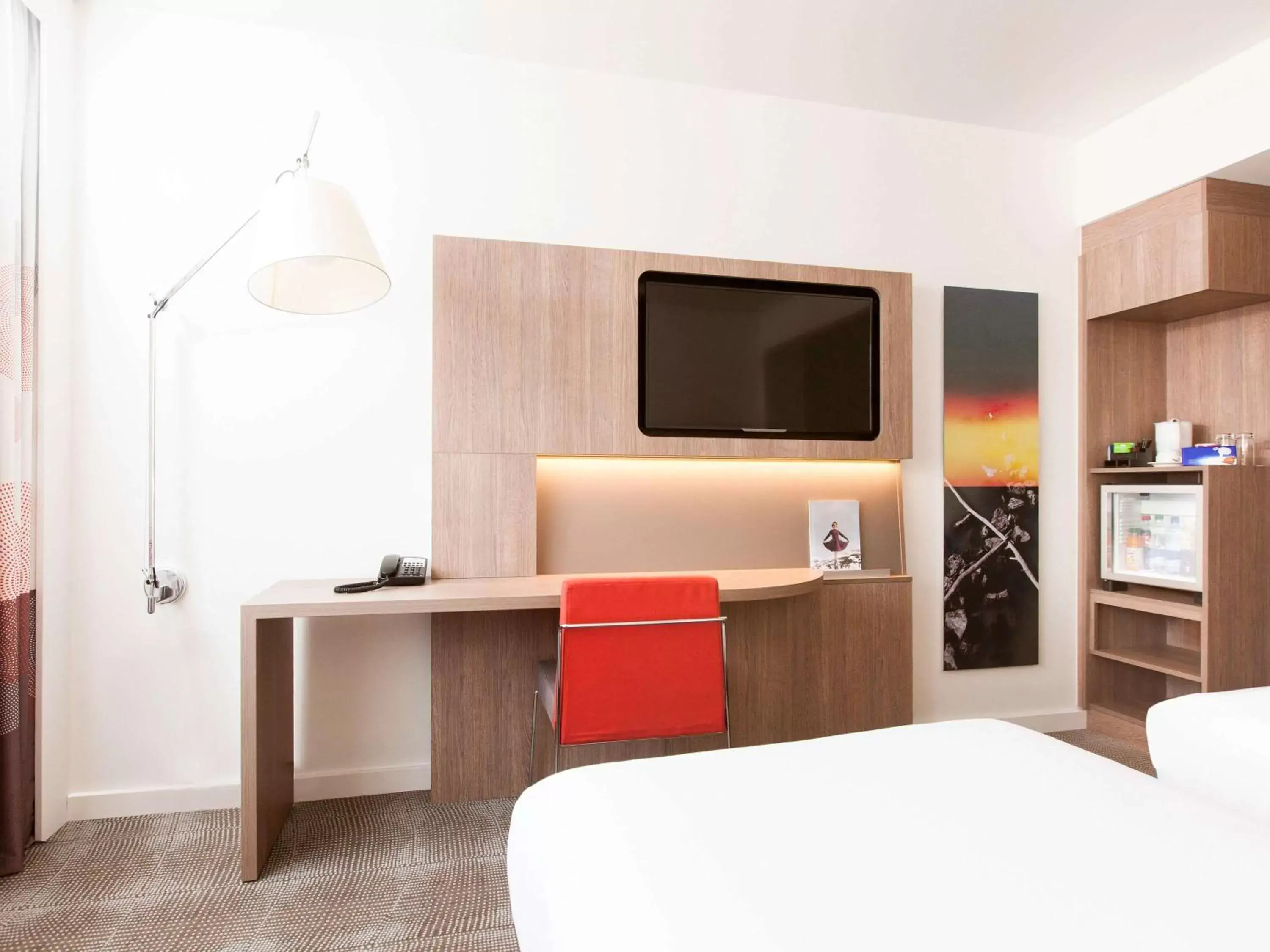 Photo of the whole room, TV/Entertainment Center in Novotel Basel City