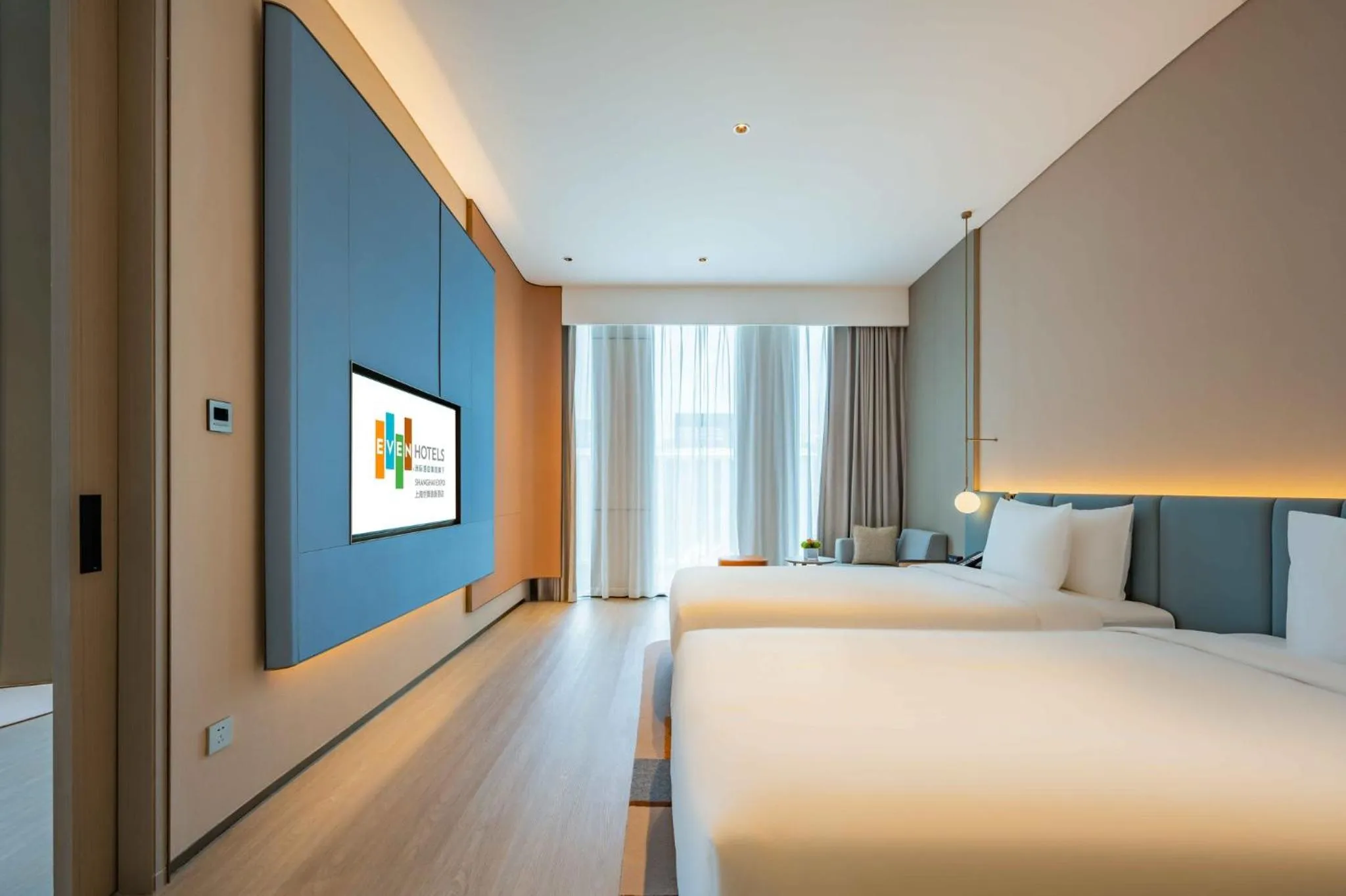 Photo of the whole room, Bed in EVEN Hotels Shanghai Expo by IHG