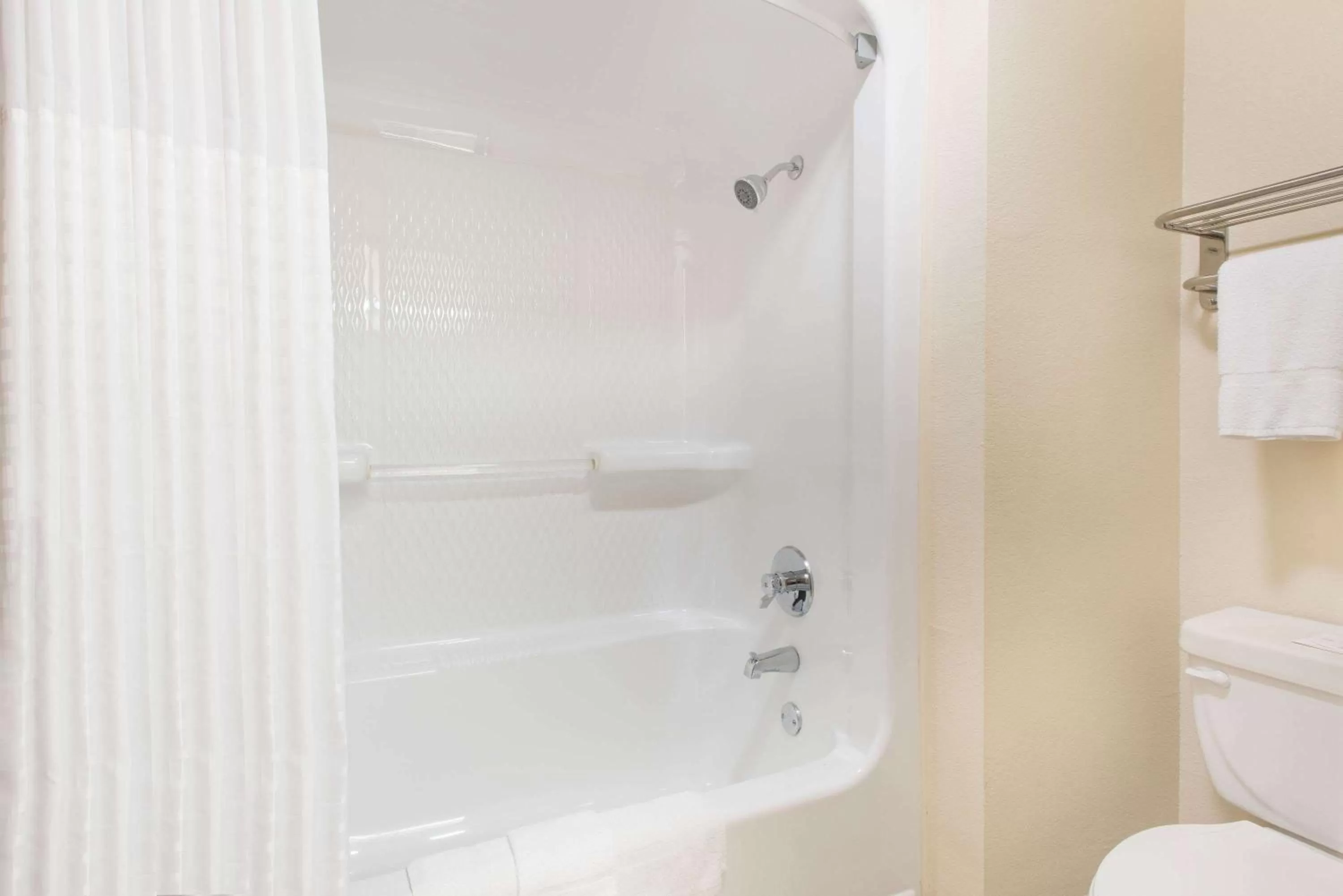 Bathroom in Super 8 by Wyndham Claremore OK