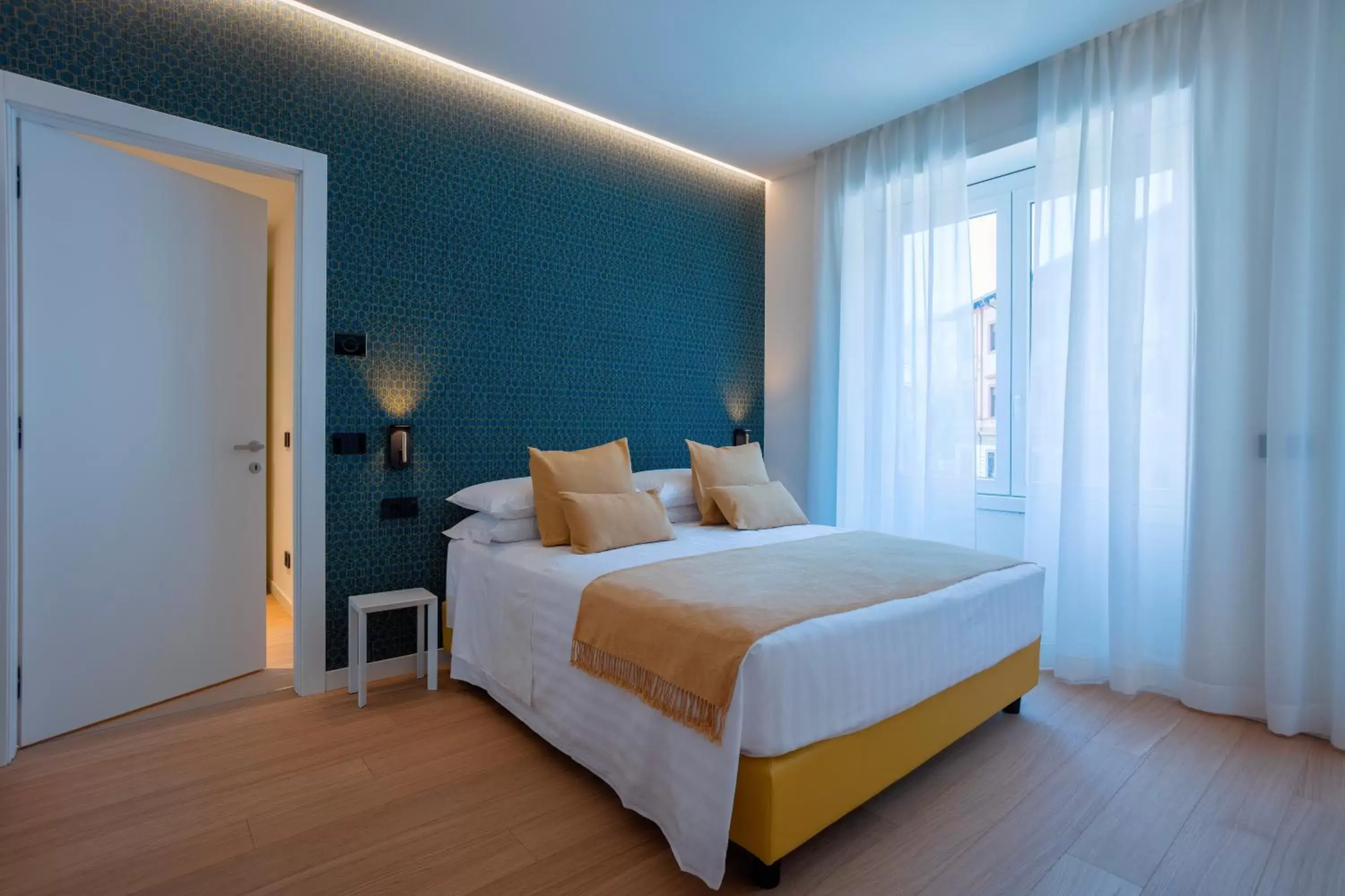 Bed in Sant'Ambrogio Apartments
