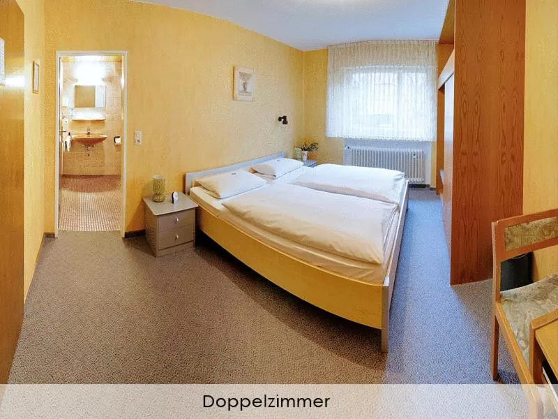 Bed in Hotel Keinath Stuttgart