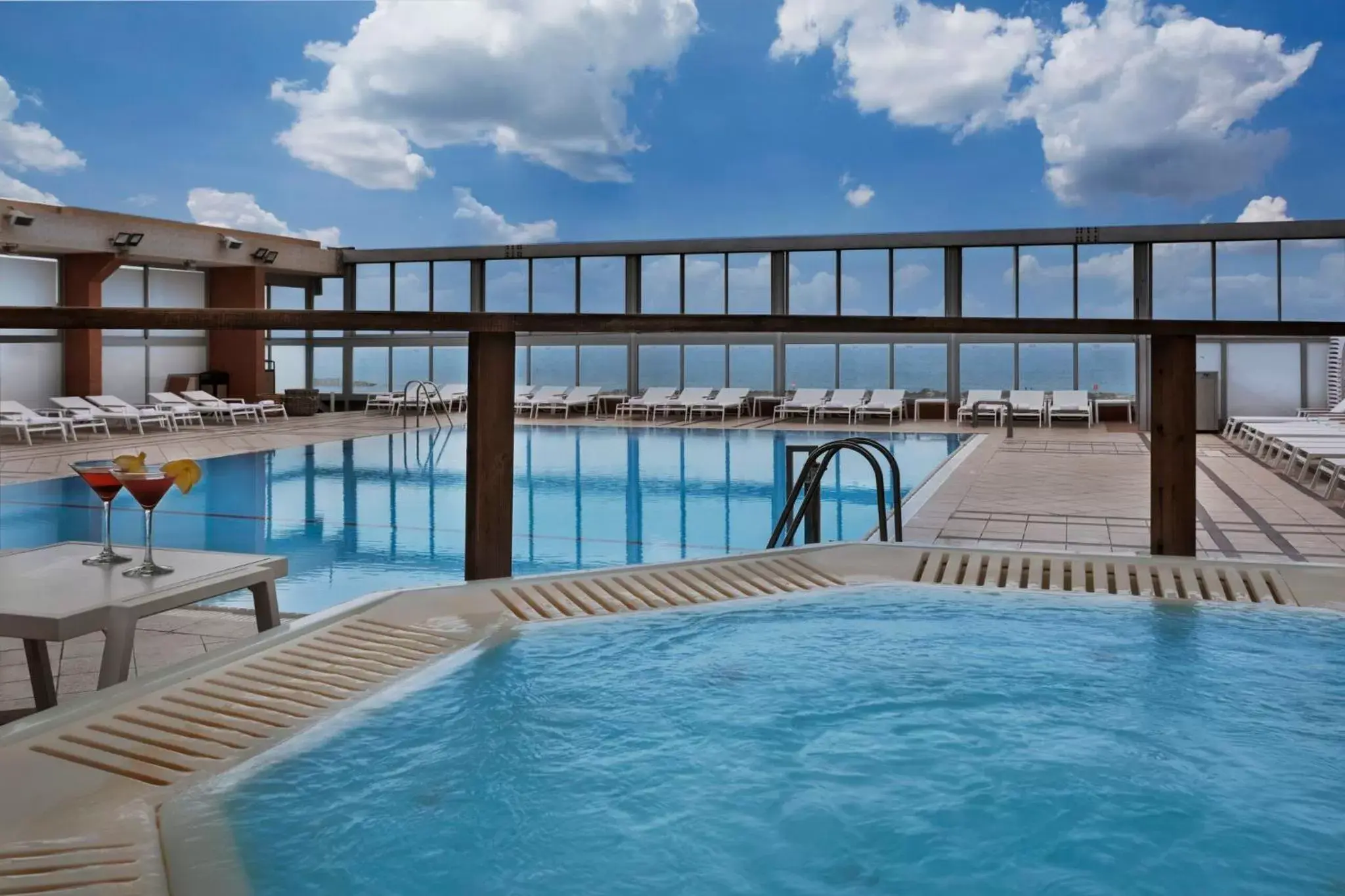 Swimming Pool in Crowne Plaza Tel Aviv Beach, an IHG Hotel