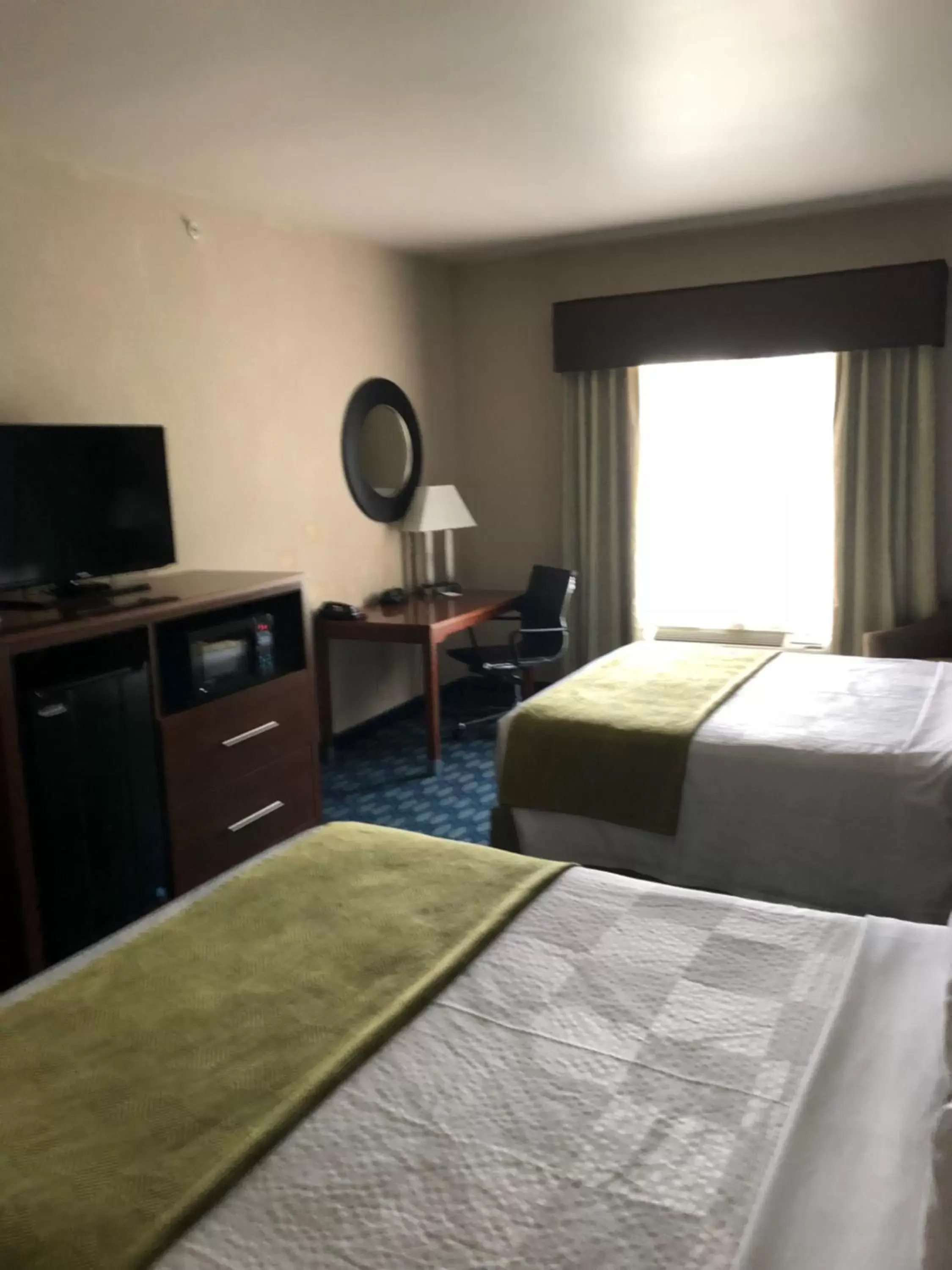 Bed in Countryview Inn & Suites Bed in Countryview Inn & Suites