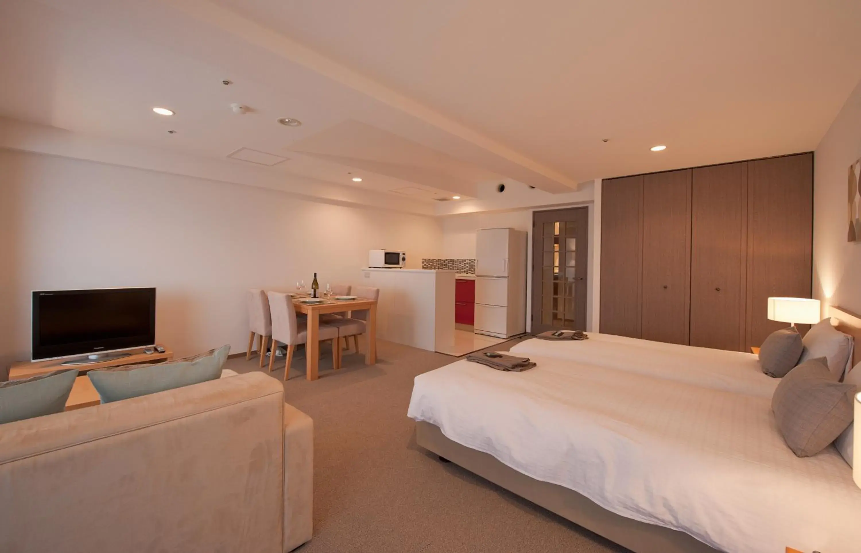 Photo of the whole room, TV/Entertainment Center in One Niseko Resort Towers