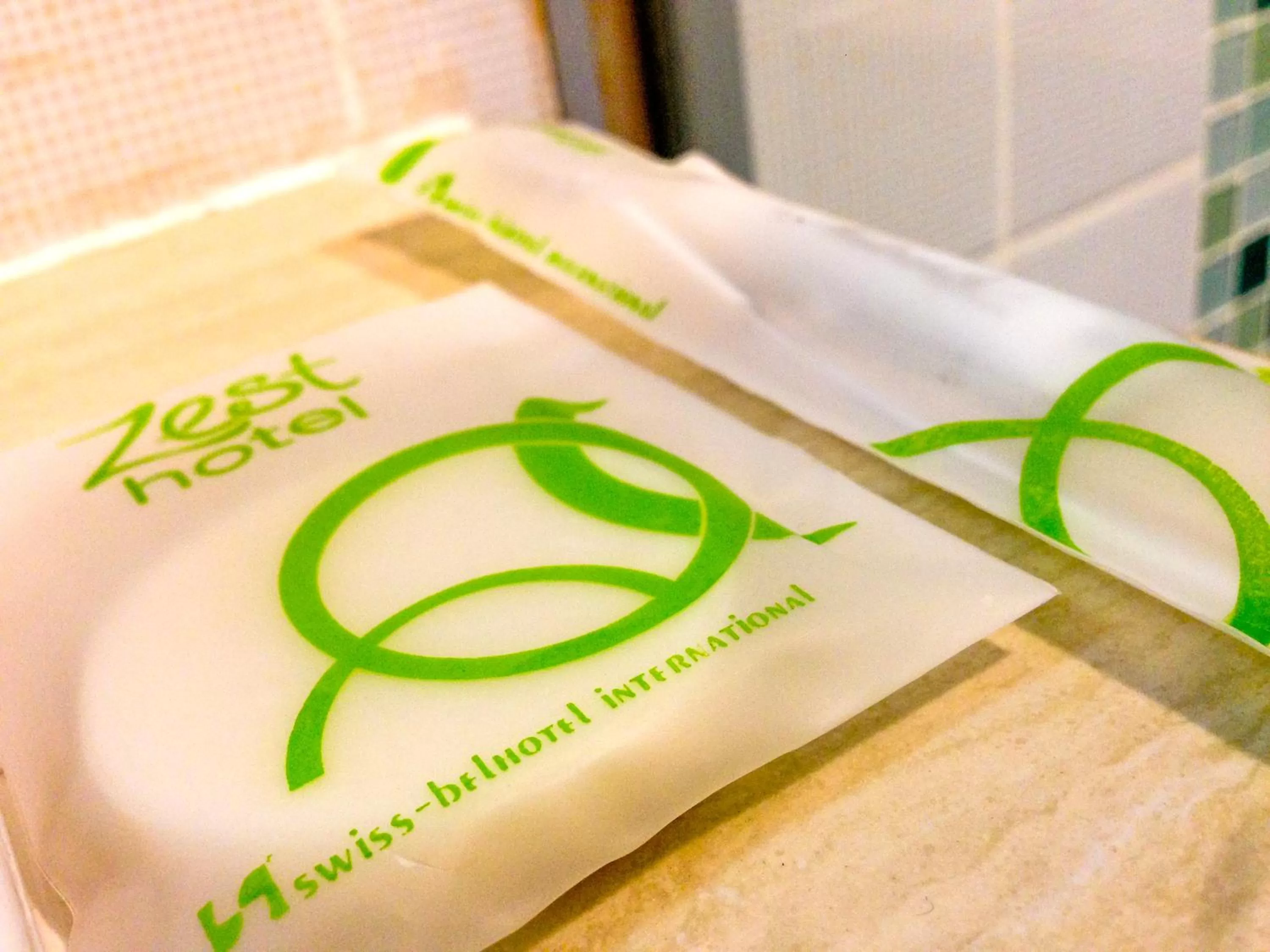 Property logo or sign in Zest Legian by Swiss-Belhotel International