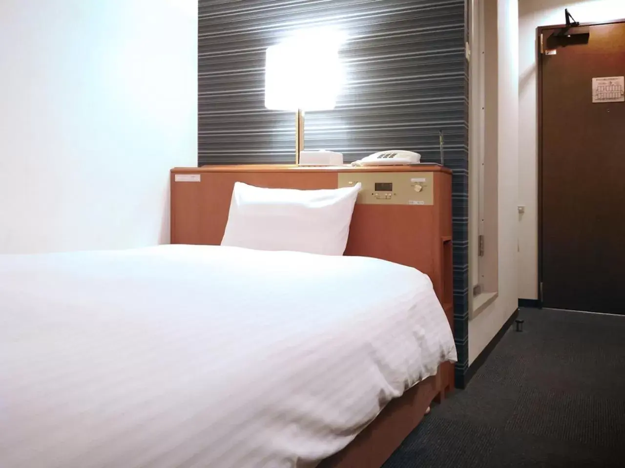 Bed in Smile Hotel Towada