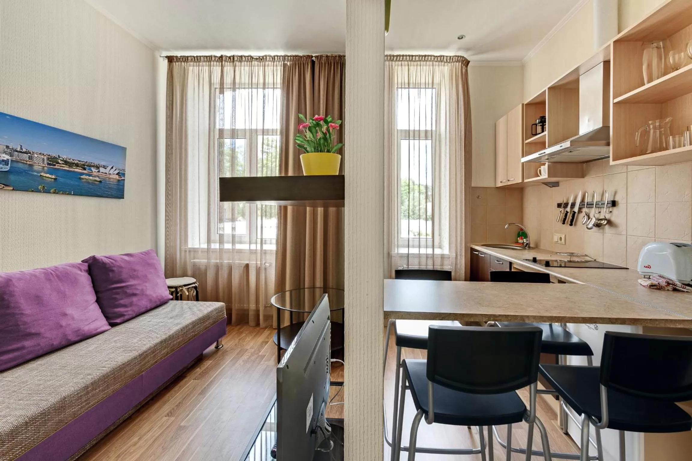 Kitchen or kitchenette in RIGAAPARTMENT SONADA Family Aparthotel - Private Parking