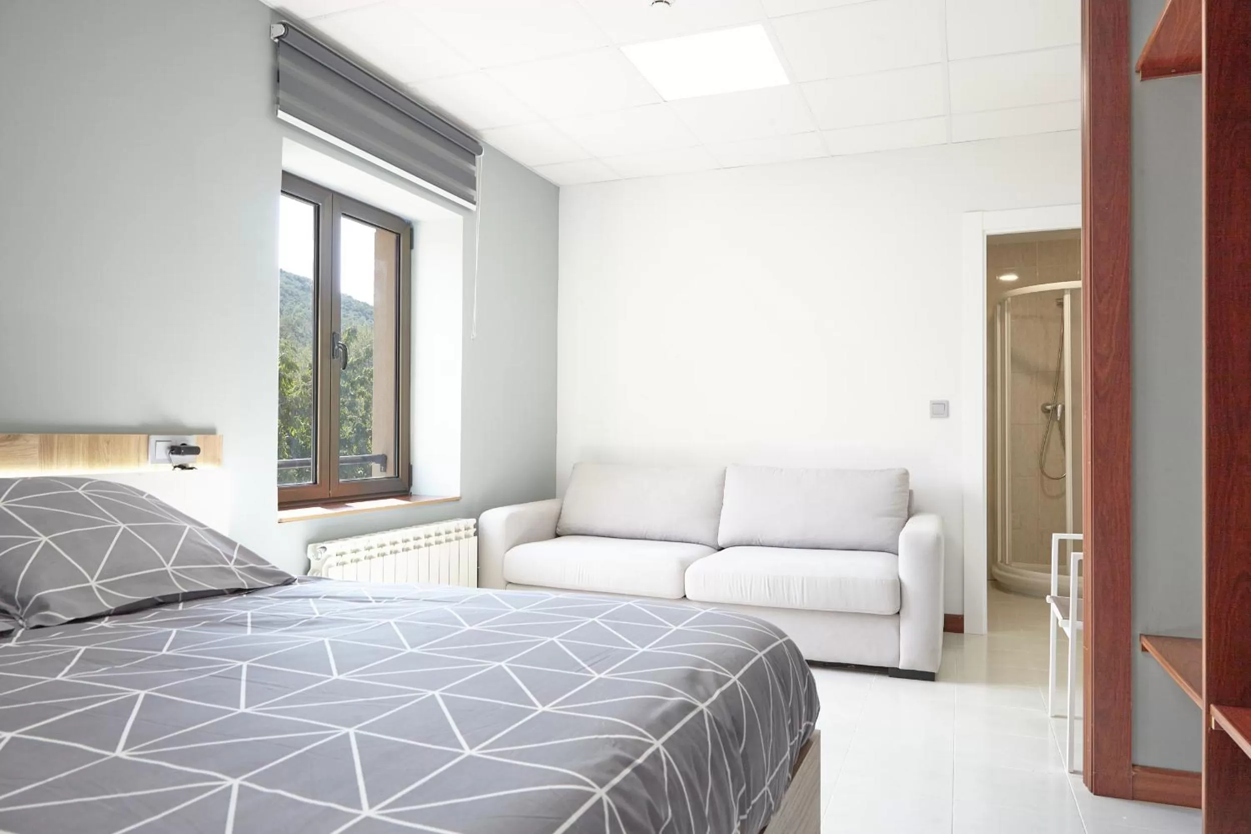 Bed in HOSTAL FONTAÑAN