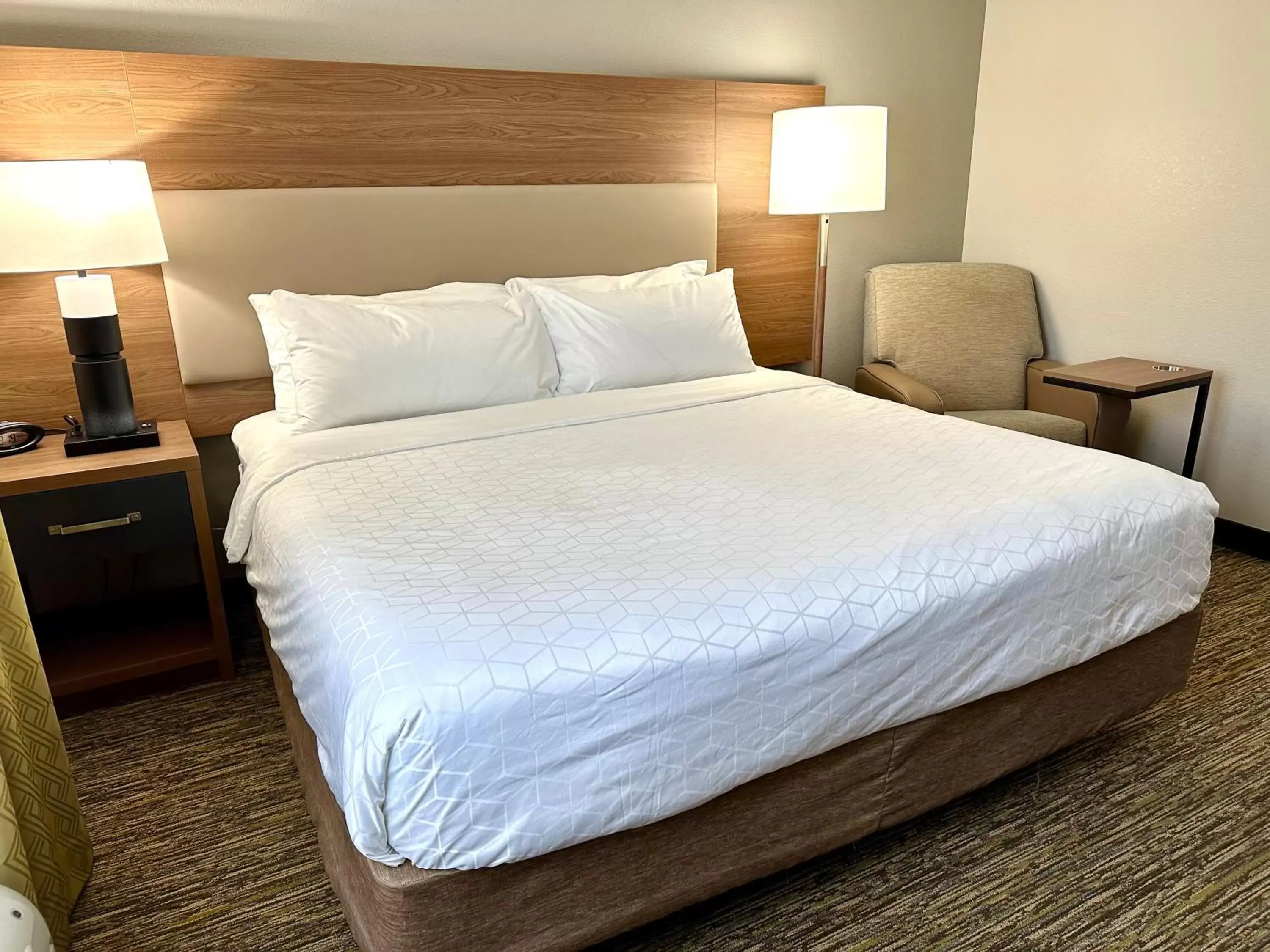 Bed in Candlewood Suites Savannah Airport, an IHG Hotel