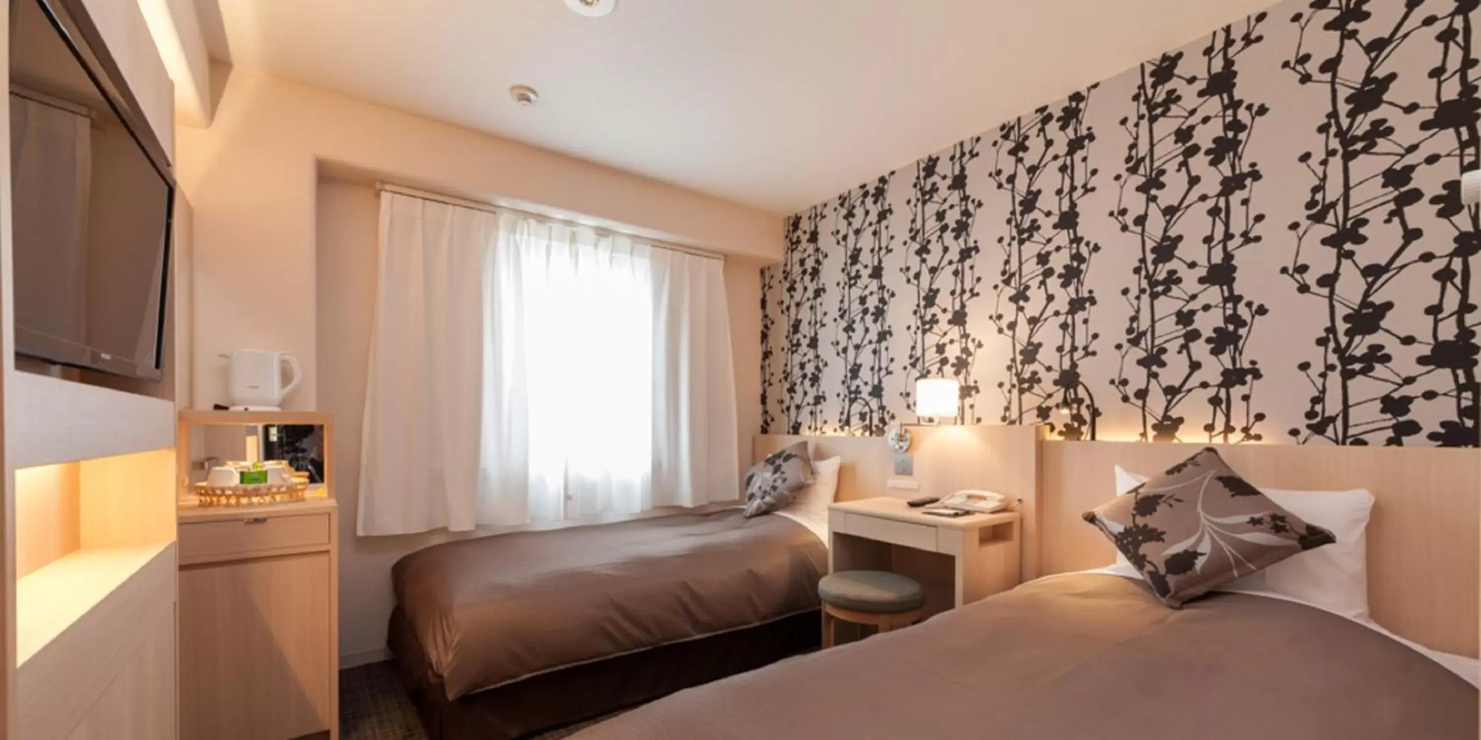 Photo of the whole room, Bed in Nishitetsu Resort Inn Beppu