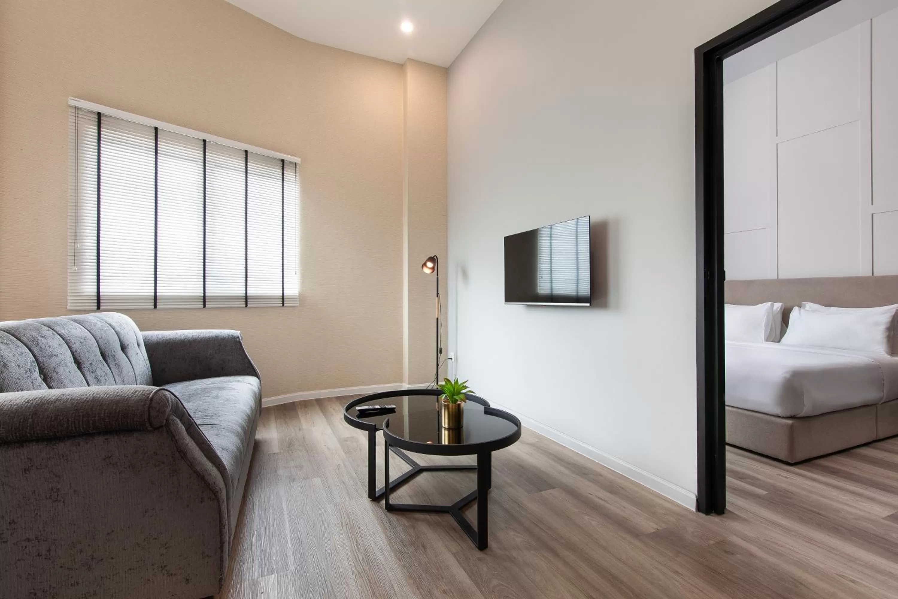 Living room, Bed in Wesley Hotel