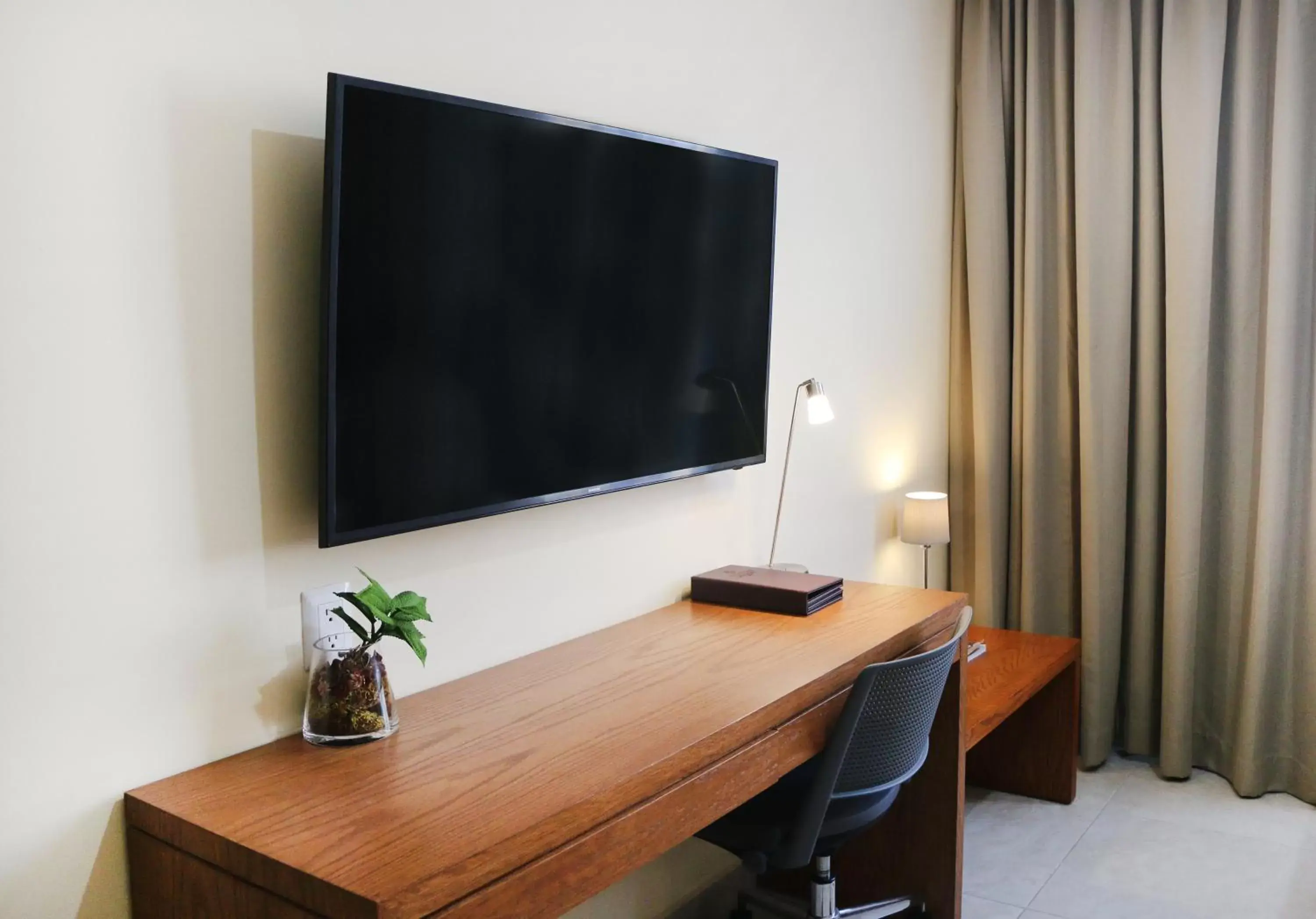 Photo of the whole room, TV/Entertainment Center in Gamma Mazatlan The Inn At Centro Historico