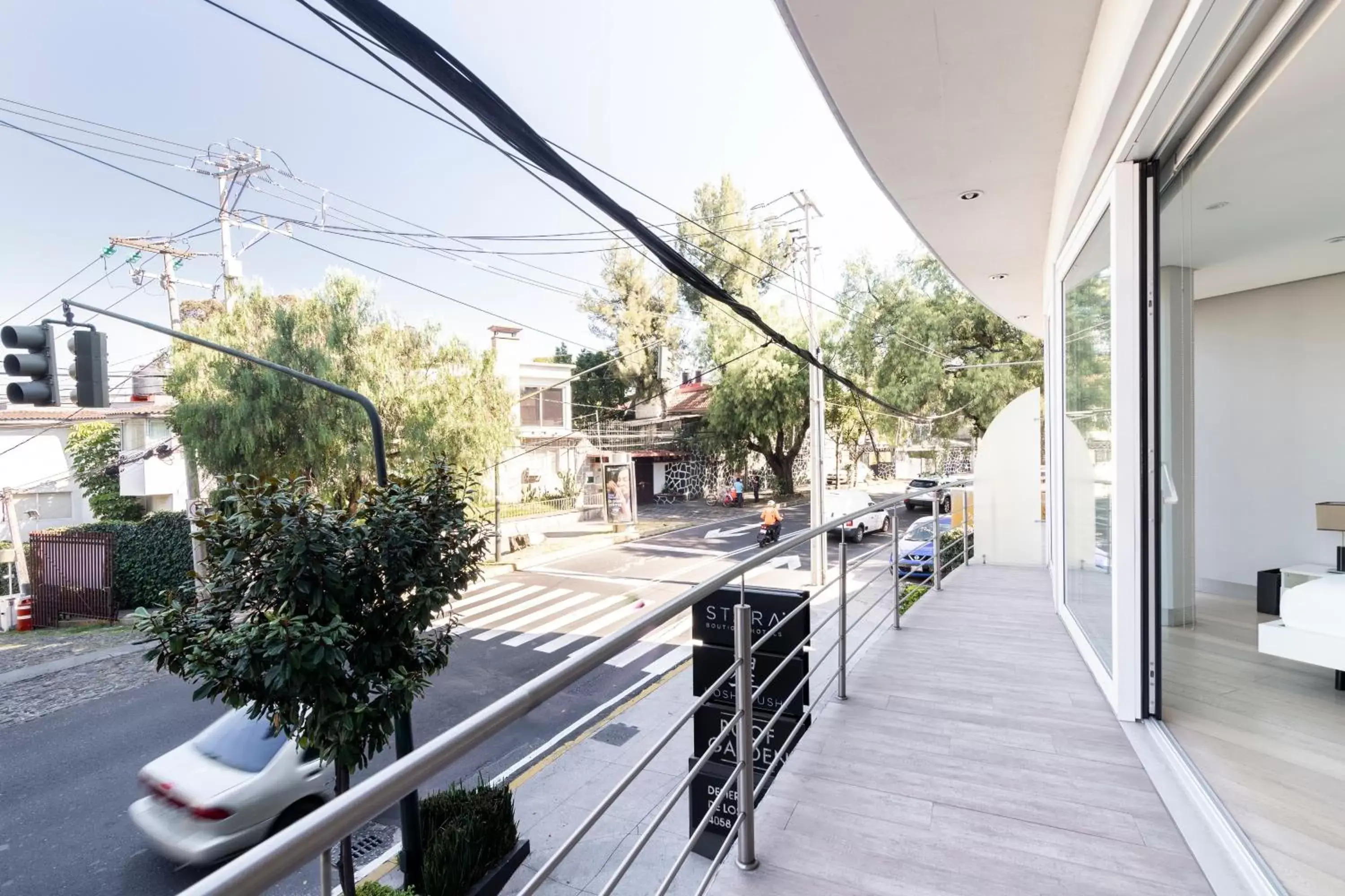 Street view, Balcony/Terrace in Capitalia - ApartHotel - San Angel Inn