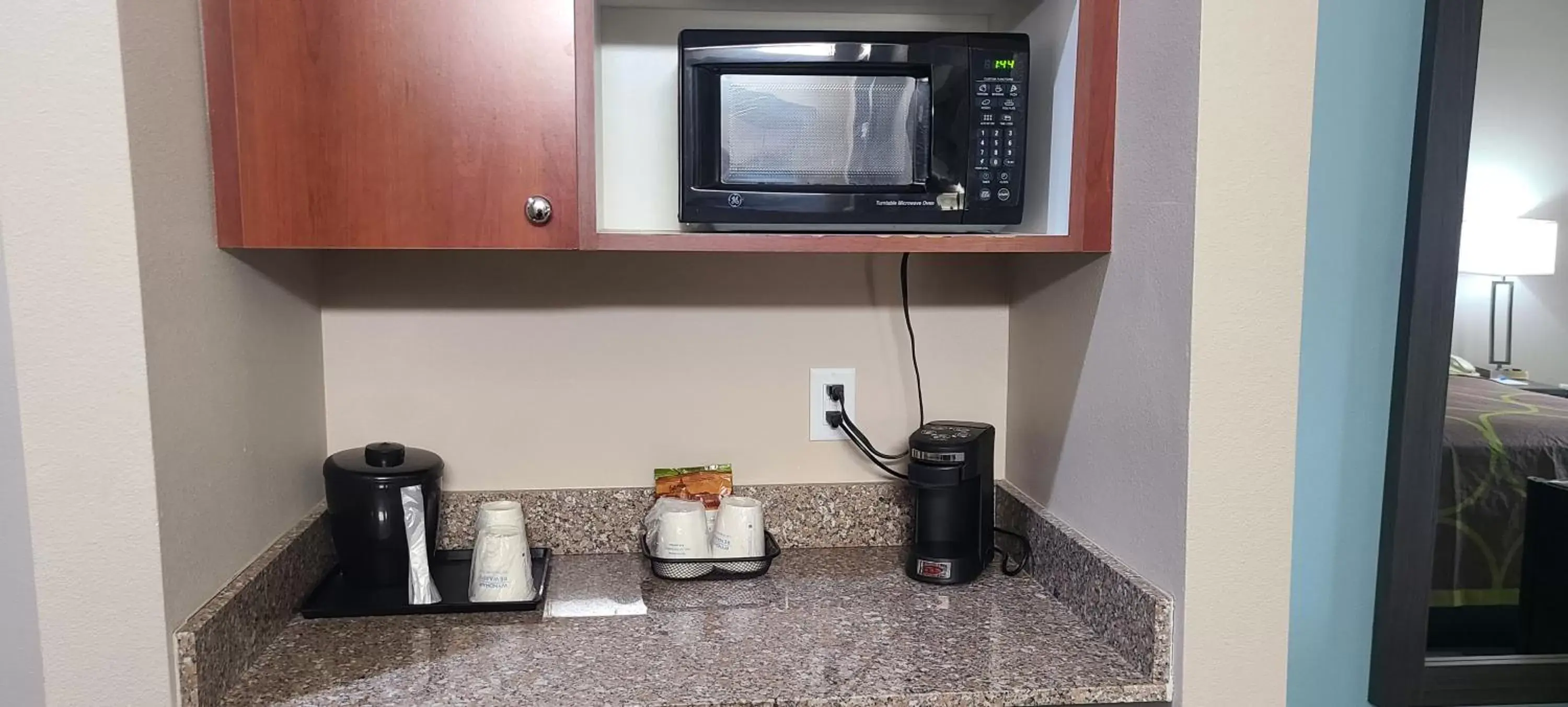 Coffee/tea facilities, Kitchen/Kitchenette in Super 8 by Wyndham Lubbock West