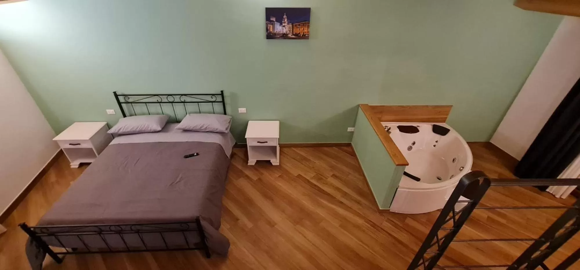 Photo of the whole room, Bed in IL MASCHERONE