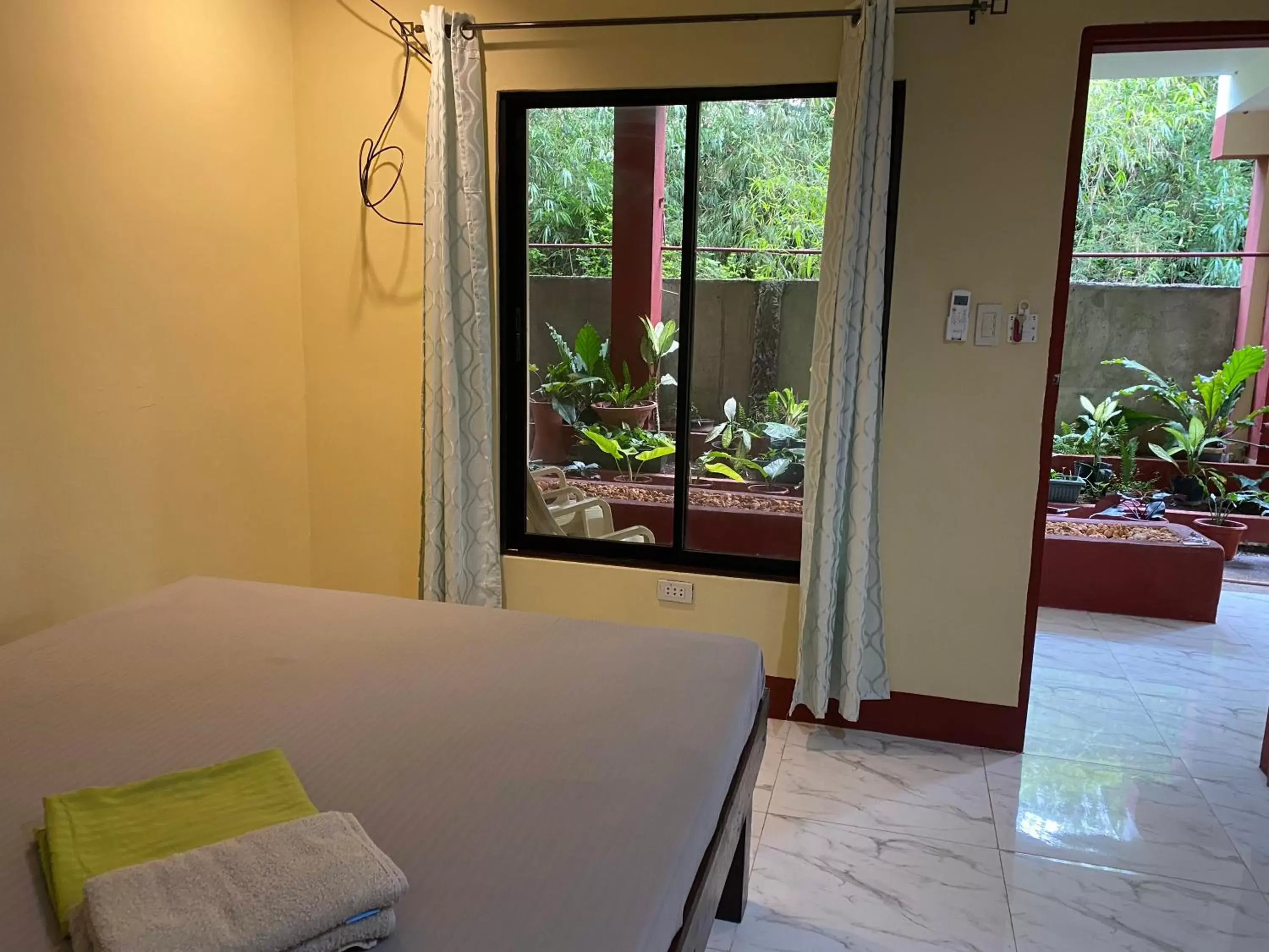 Queen Room with Garden View in One 4 Da Road Queen Room with Garden View in One 4 Da Road