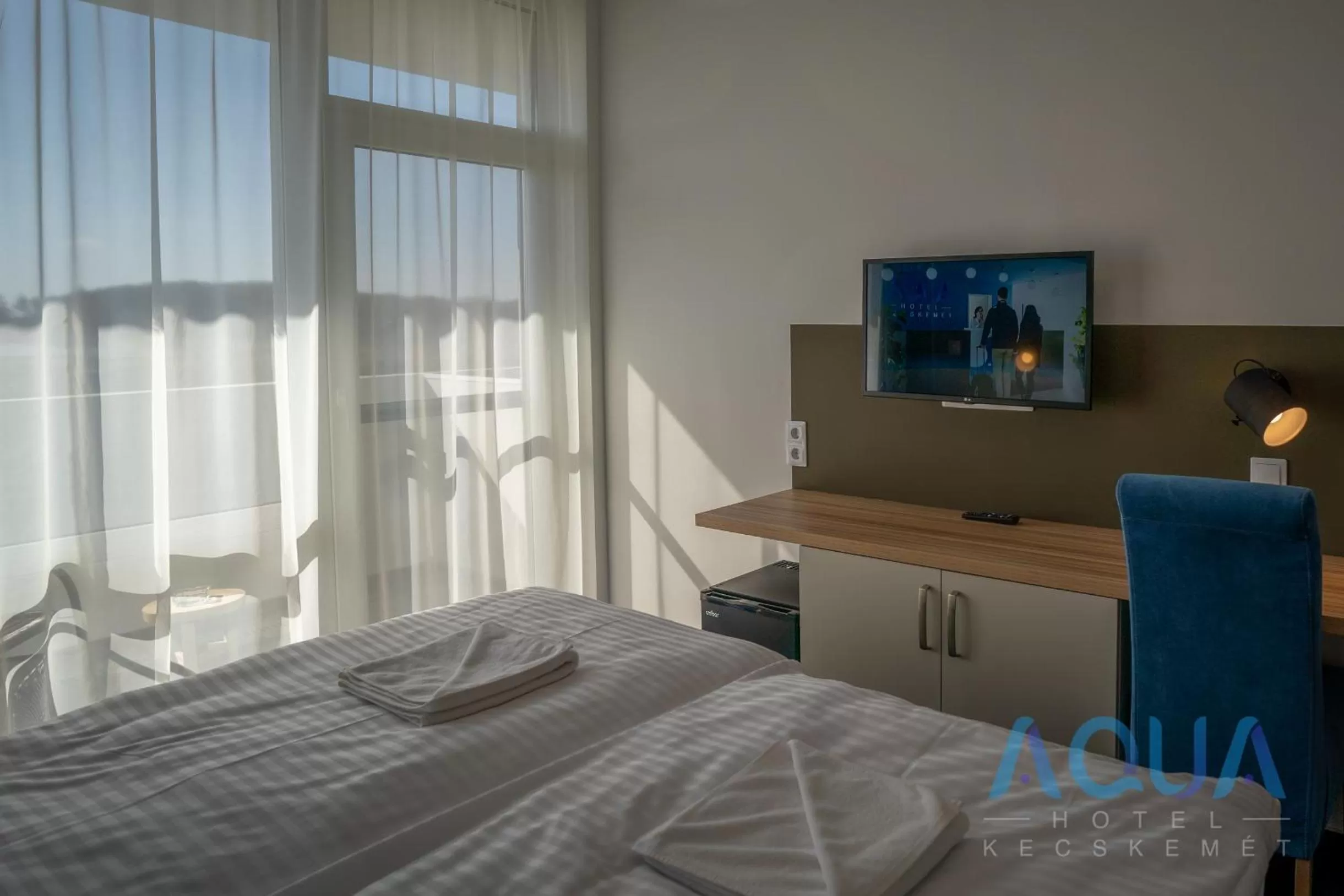 Photo of the whole room, Bed in Aqua Hotel