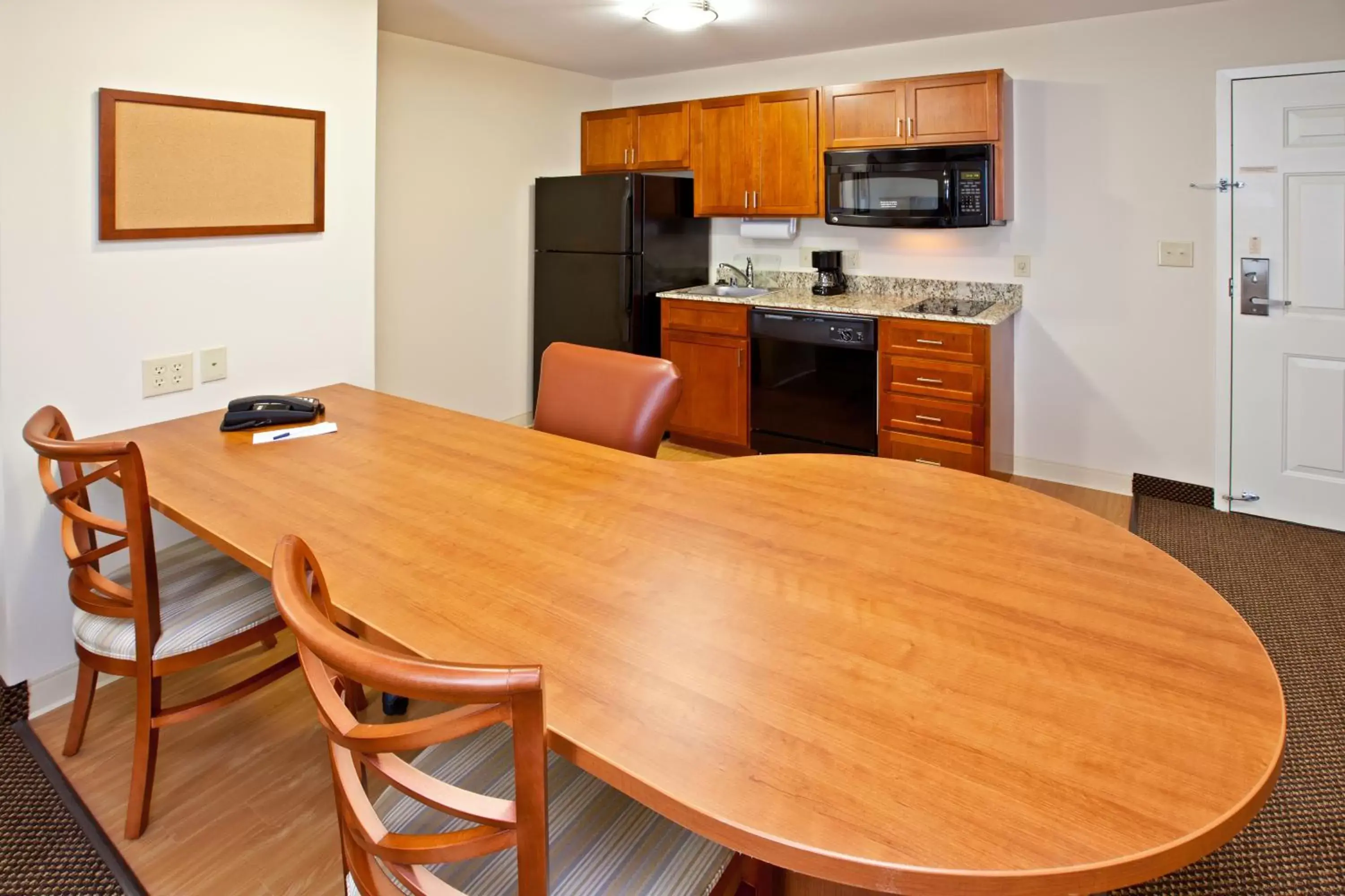 Kitchen or kitchenette, Kitchen/Kitchenette in Candlewood Suites Radcliff - Fort Knox, an IHG Hotel