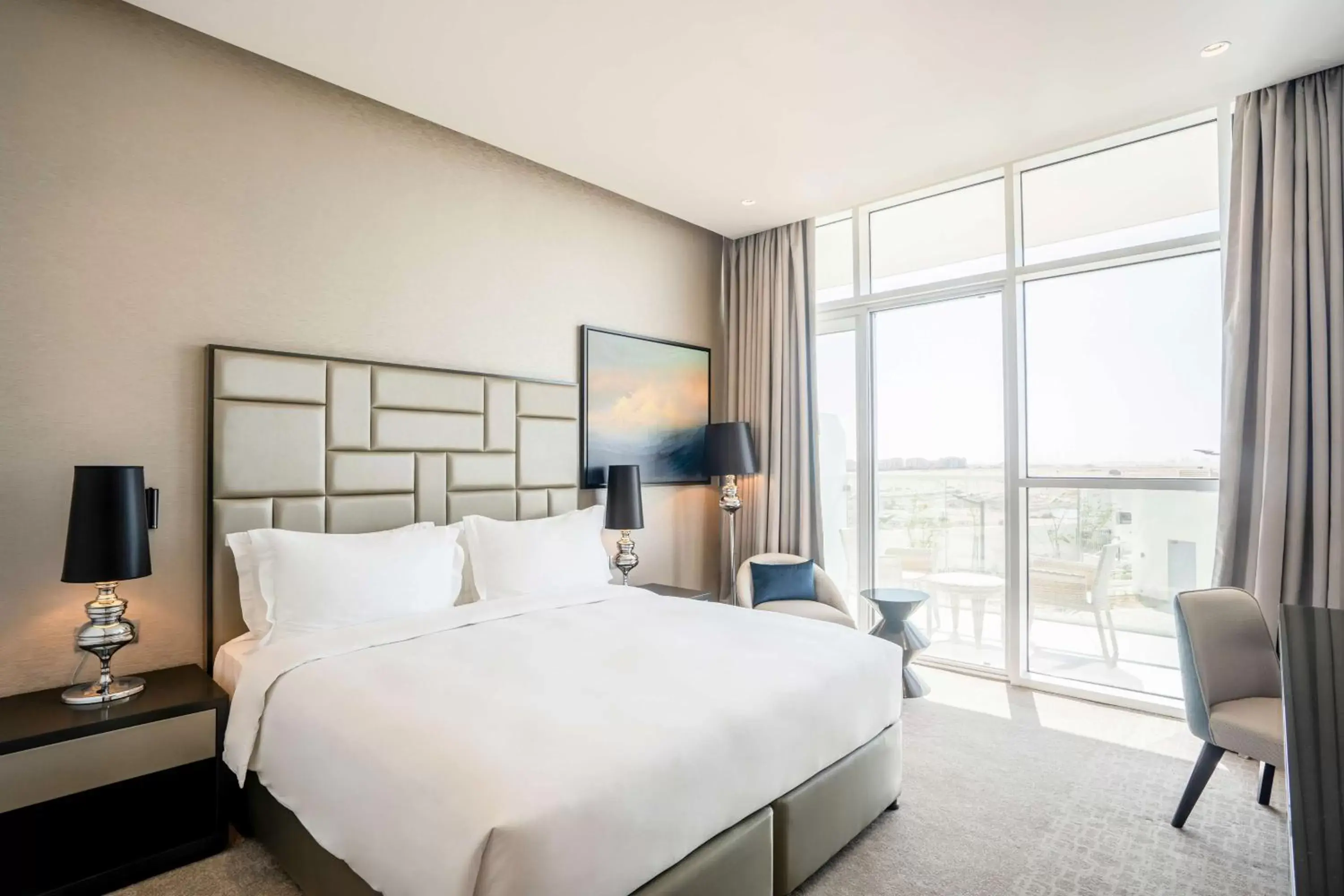 Photo of the whole room, Bed in Radisson Dubai Damac Hills
