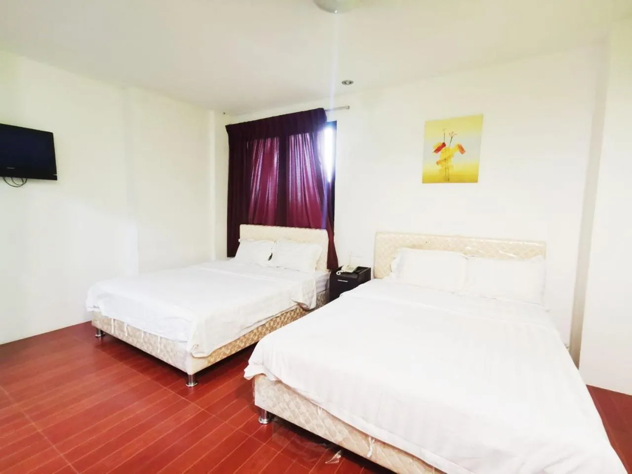 Bed in Homestay Kuching Hotel
