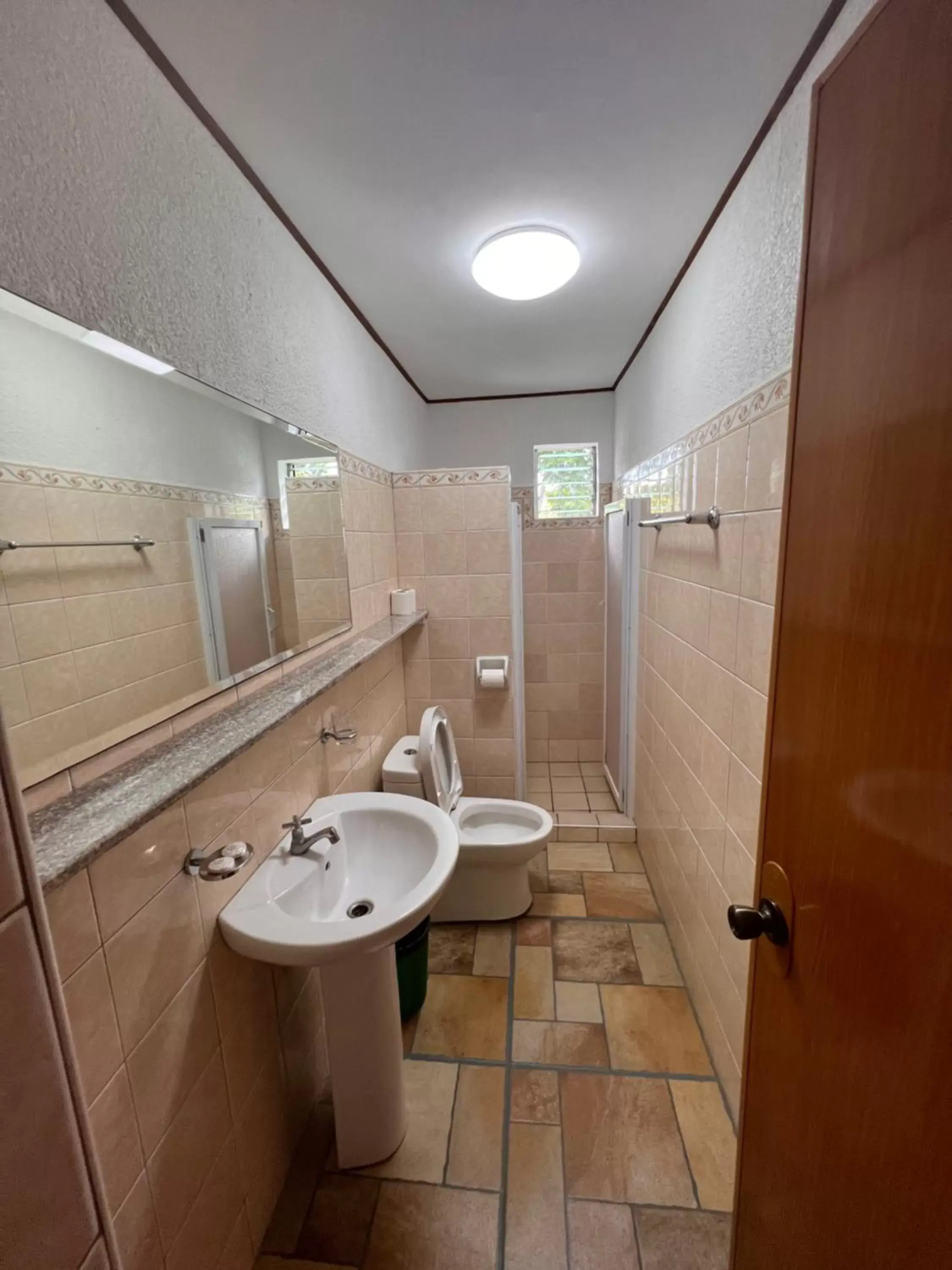 Bathroom in Alona Swiss Resort